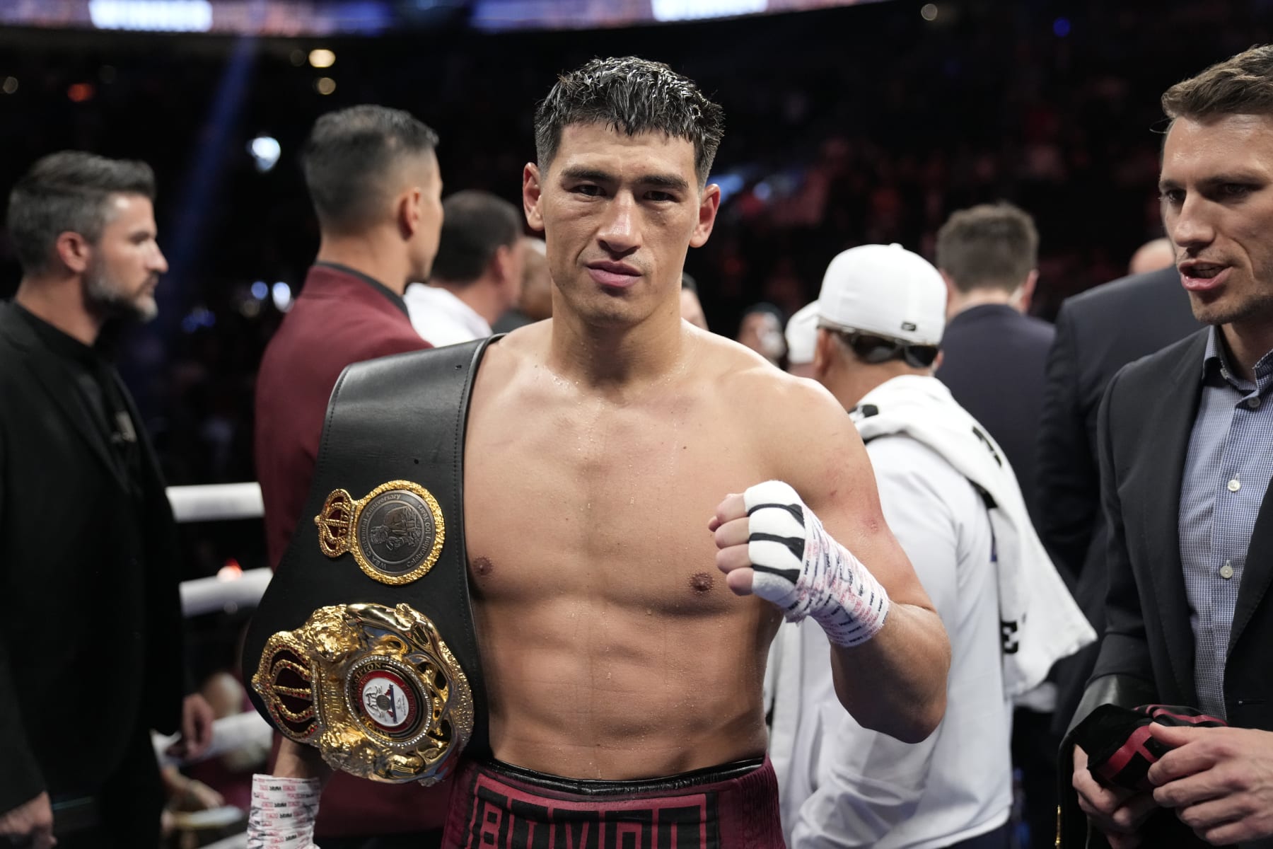Dmitry Bivol, of Kyrgyzstan, celebrates after winning a light heavyweight title boxing match against Canelo Alvarez, of Mexico, Saturday, May 7, 2022, in Las Vegas. (AP Photo/John Locher)