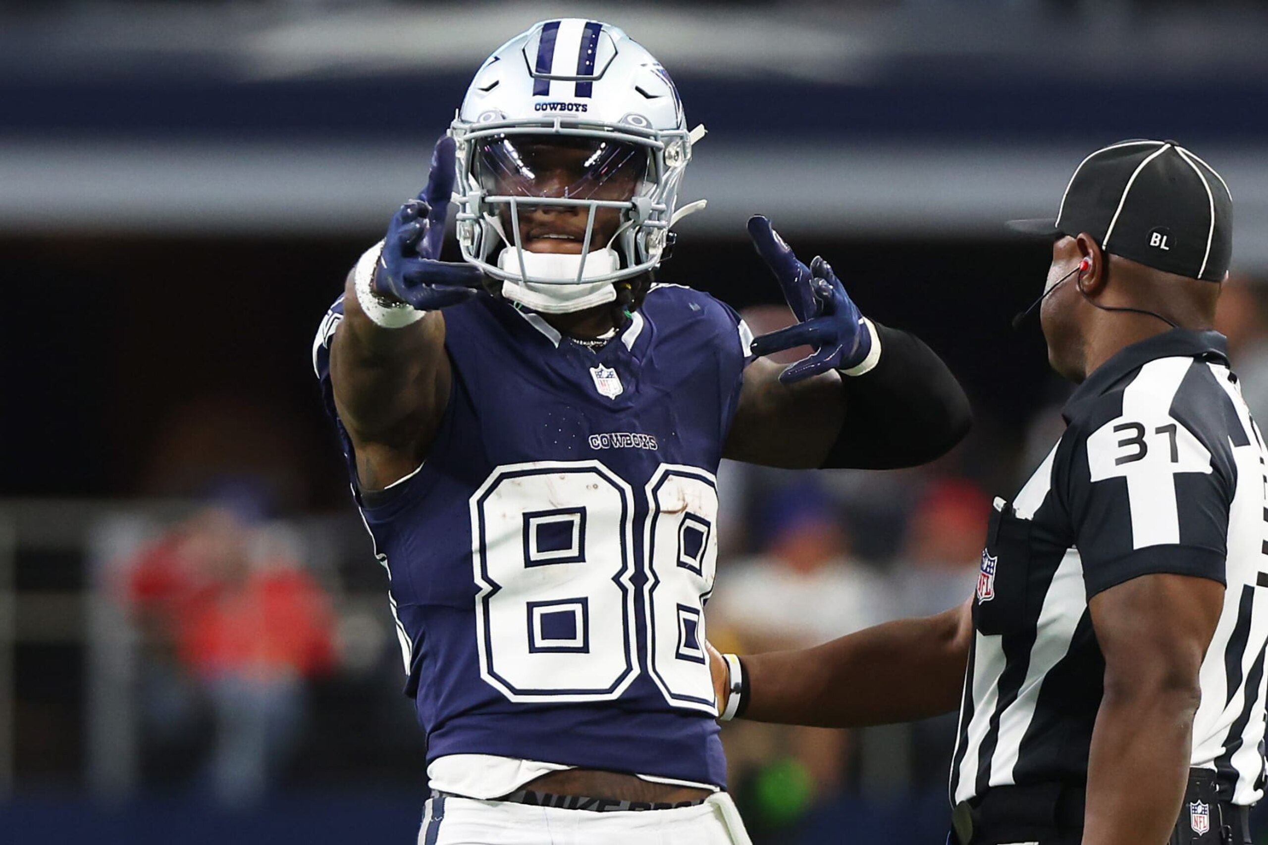 ARLINGTON, TEXAS - OCTOBER 29: CeeDee Lamb #88 of the Dallas Cowboys gestures after a first down in the first quarter of a game against the Los Angeles Rams at AT&T Stadium on October 29, 2023 in Arlington, Texas. (Photo by Richard Rodriguez/Getty Images)