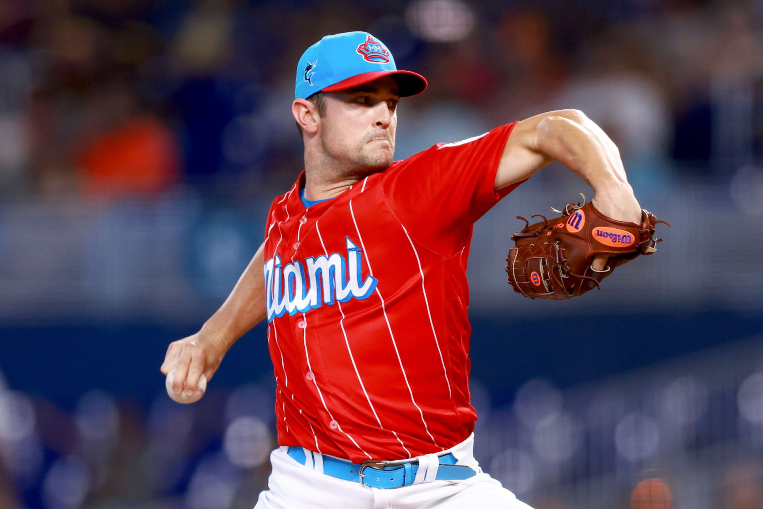 MIAMI, FLORIDA - AUGUST 26: David Robertson #19 of the Miami Marlins pitches against the Washington Nationals during the ninth inning at loanDepot park on August 26, 2023 in Miami, Florida. (Photo by Megan Briggs/Getty Images)