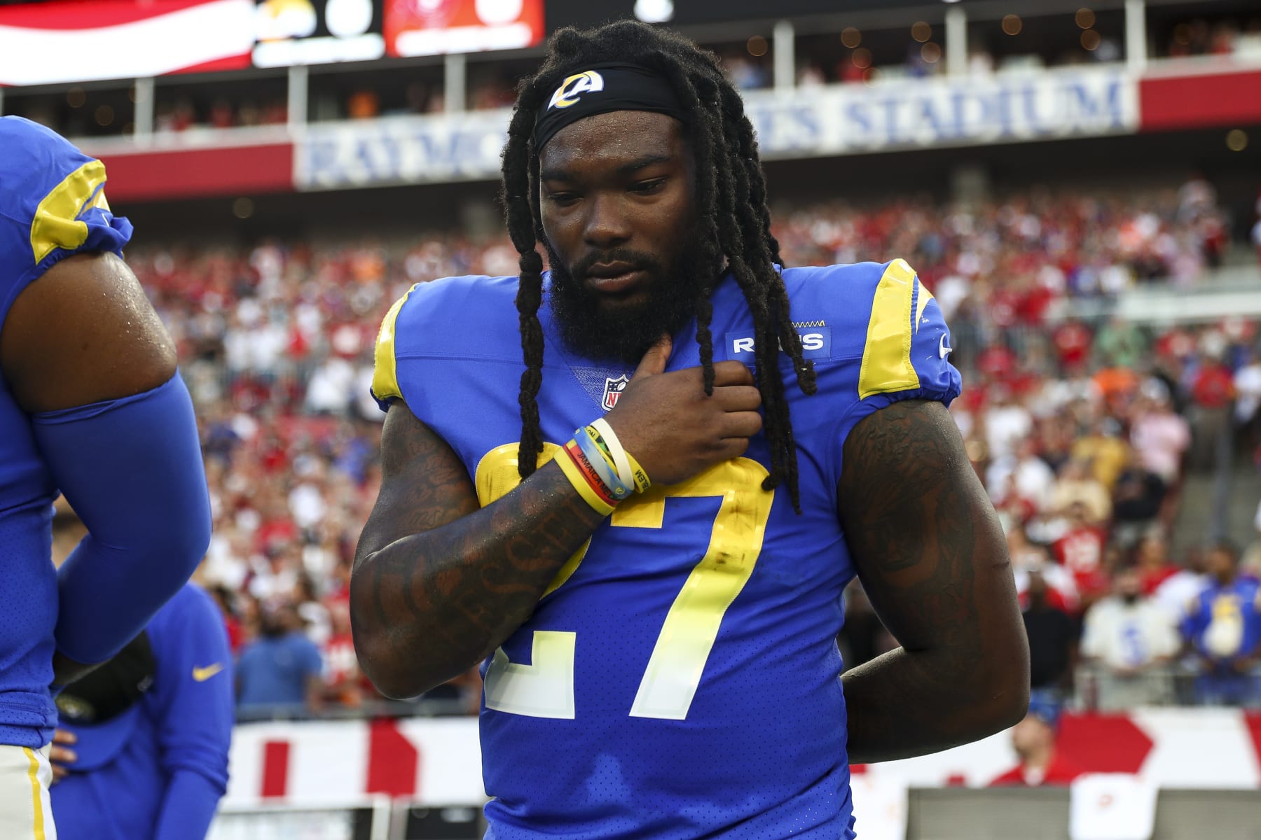 TAMPA, FL - NOVEMBER 6: Darrell Henderson Jr. #27 of the Los Angeles Rams stands during the national anthem prior to an NFL football game against the Tampa Bay Buccaneers at Raymond James Stadium on November 6, 2022 in Tampa, Florida. (Photo by Kevin Sabitus/Getty Images)