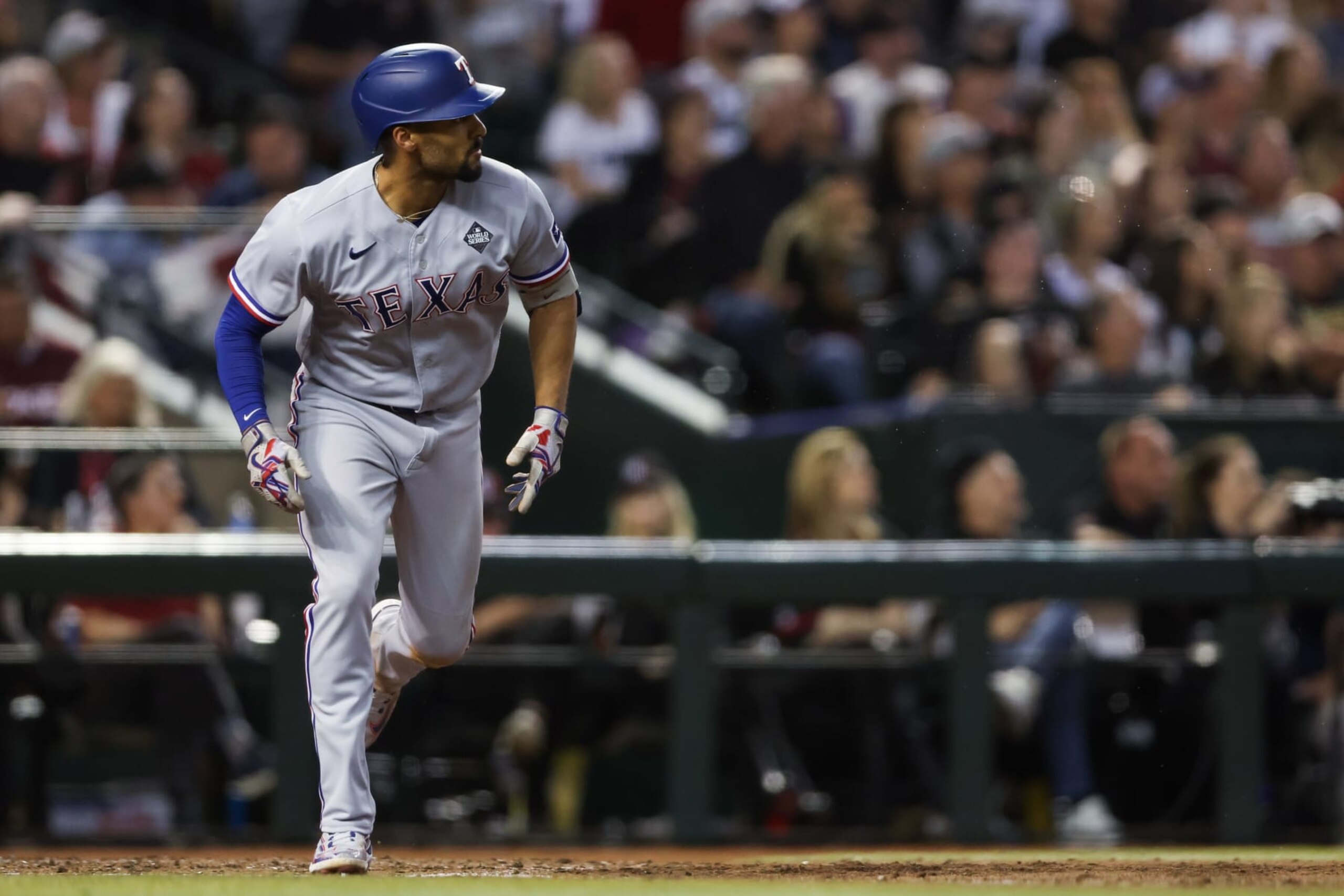 PHOENIX, AZ - OCTOBER 31:   Marcus Semien #2 of the Texas Rangers hits a three-run home run in the third inning during Game 4 of the 2023 World Series between the Texas Rangers and the Arizona Diamondbacks at Chase Field on Tuesday, October 31, 2023 in Phoenix, Arizona. (Photo by Rob Tringali/MLB Photos via Getty Images)
