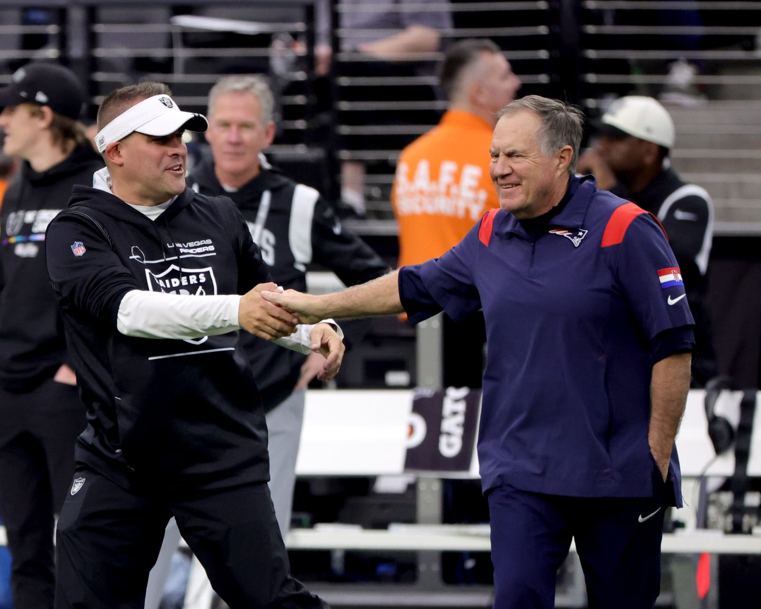 LAS VEGAS, NEVADA - chick of the New England Patriots
DECEMBER 18: Head coach Bill Belichick of the New England Patriots and head coach Josh McDaniels of the Las Vegas Raiders talk before a game at Allegiant Stadium on December 18, 2022 in Las Vegas, Nevada. (Photo by Ethan Miller/Getty Images) LAS VEGAS, NEVADA - chick of the New England Patriots
DECEMBER 18: Head coach Bill Belichick of the New England Patriots and head coach Josh McDaniels of the Las Vegas Raiders talk before a game at Allegiant Stadium on December 18, 2022 in Las Vegas, Nevada. (Photo by Ethan Miller/Getty Images)