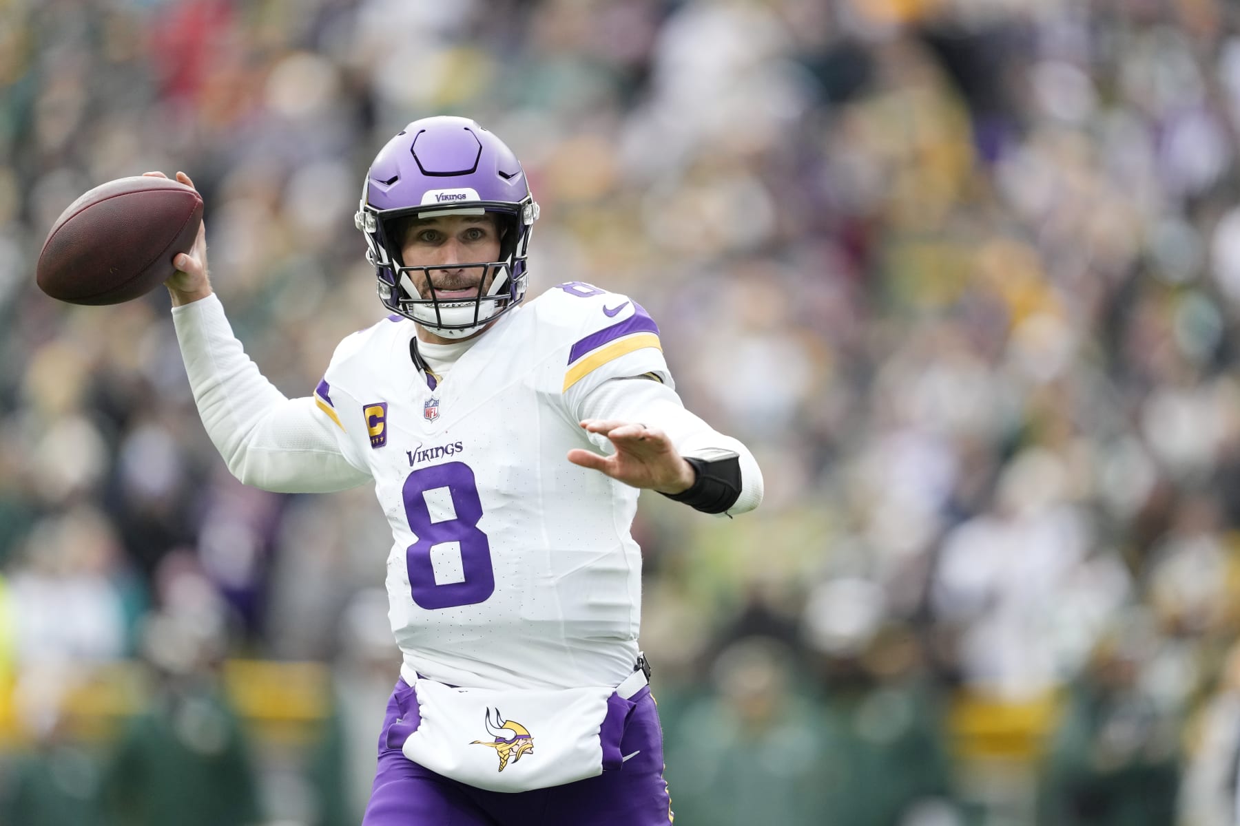 GREEN BAY, WISCONSIN - OCTOBER 29: Kirk Cousins #8 of the Minnesota Vikings looks to throw a pass in the third quarter against the Green Bay Packers at Lambeau Field on October 29, 2023 in Green Bay, Wisconsin. (Photo by Patrick McDermott/Getty Images)
