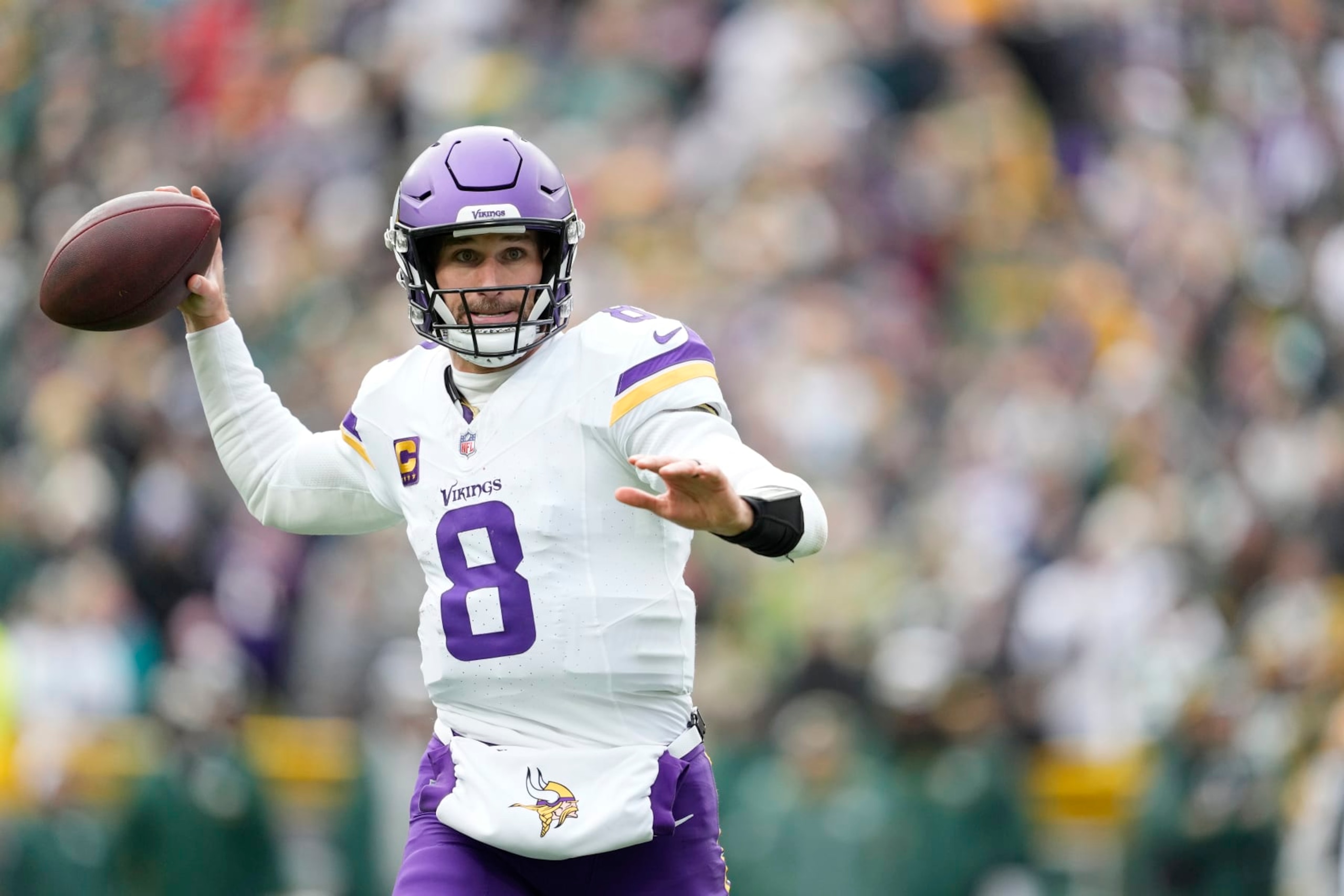 GREEN BAY, WISCONSIN - OCTOBER 29: Kirk Cousins #8 of the Minnesota Vikings looks to throw a pass in the third quarter against the Green Bay Packers at Lambeau Field on October 29, 2023 in Green Bay, Wisconsin. (Photo by Patrick McDermott/Getty Images)