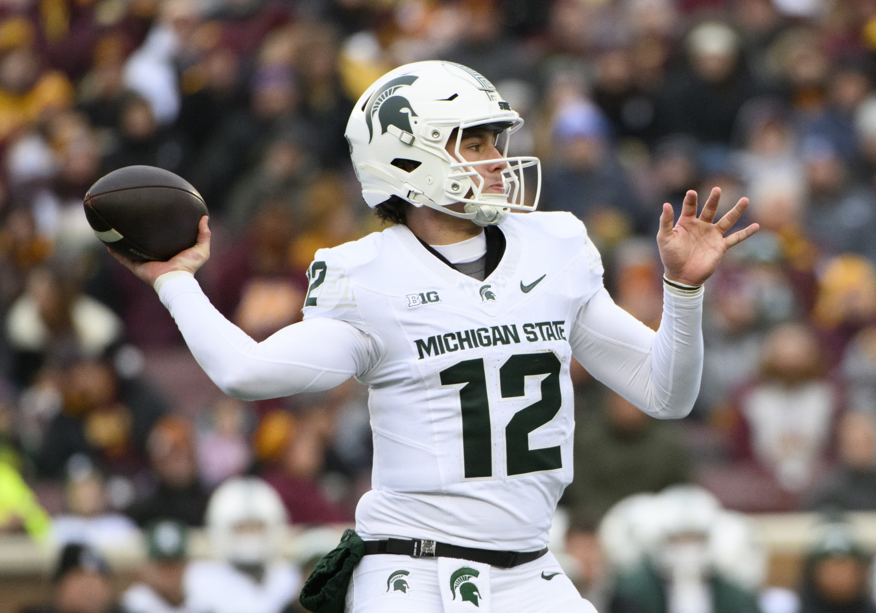 MINNEAPOLIS, MINNESOTA - OCTOBER 28: Katin Houser #12 of the Michigan State Spartans passes ball in the third quarter of the game against the Minnesota Golden Gophers at Huntington Bank Stadium on October 28, 2023 in Minneapolis, Minnesota. (Photo by Stephen Maturen/Getty Images)