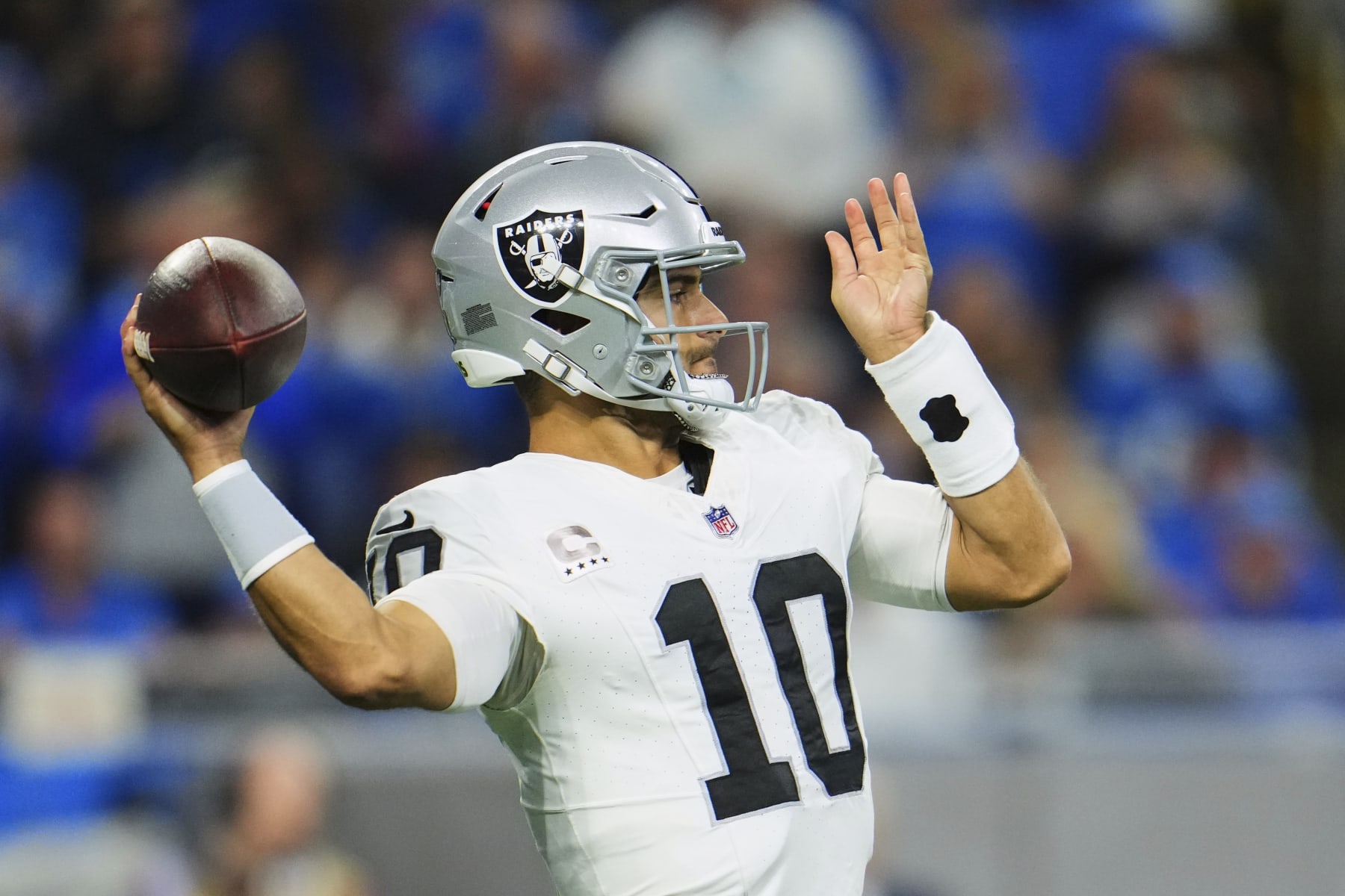 DETROIT, MI - OCTOBER 30: Jimmy Garoppolo #10 of the Las Vegas Raiders drops back to pass against the Detroit Lions at Ford Field on October 30, 2023 during the second half in Detroit, Michigan. (Photo by Cooper Neill/Getty Images)