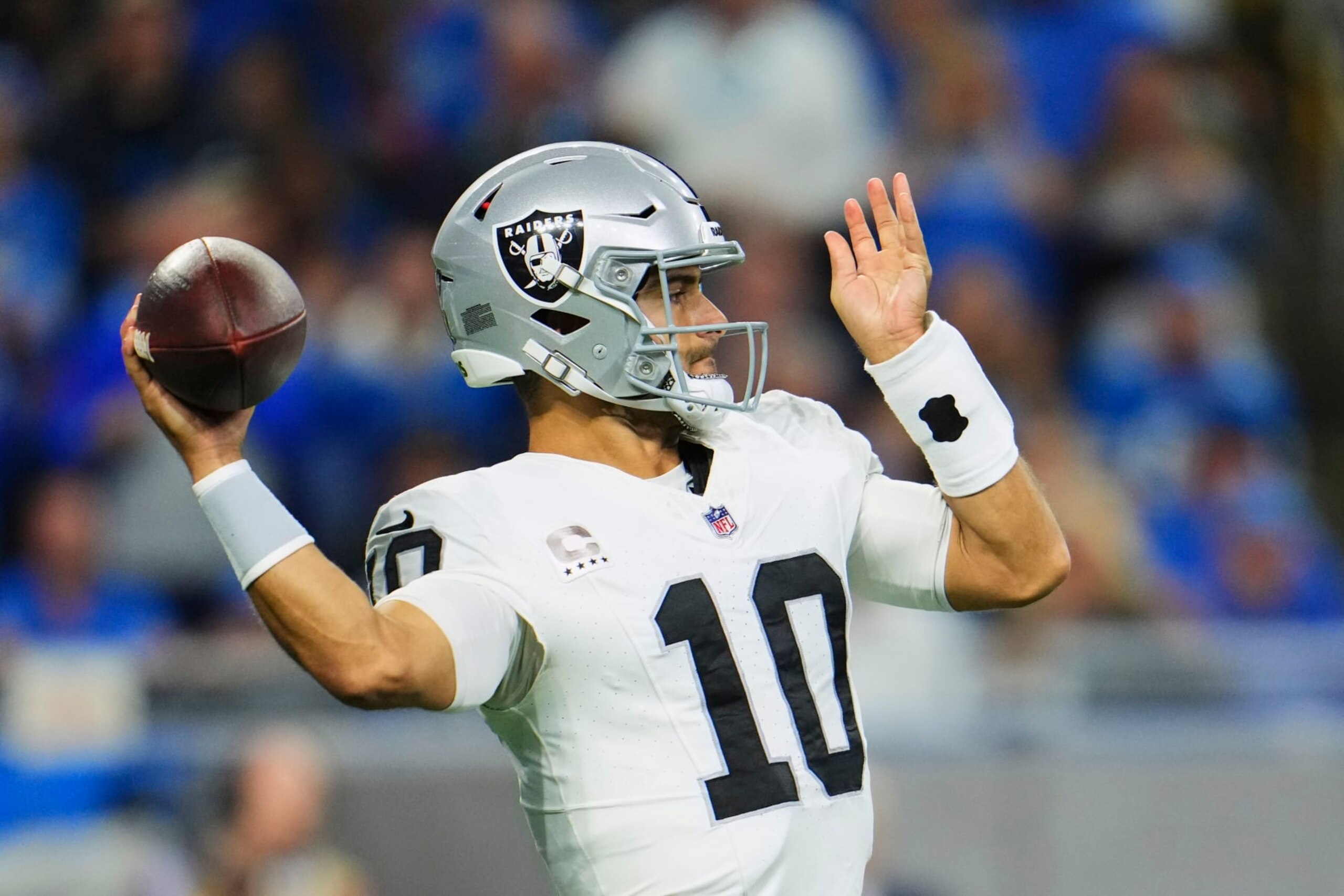 DETROIT, MI - OCTOBER 30: Jimmy Garoppolo #10 of the Las Vegas Raiders drops back to pass against the Detroit Lions at Ford Field on October 30, 2023 during the second half in Detroit, Michigan. (Photo by Cooper Neill/Getty Images)