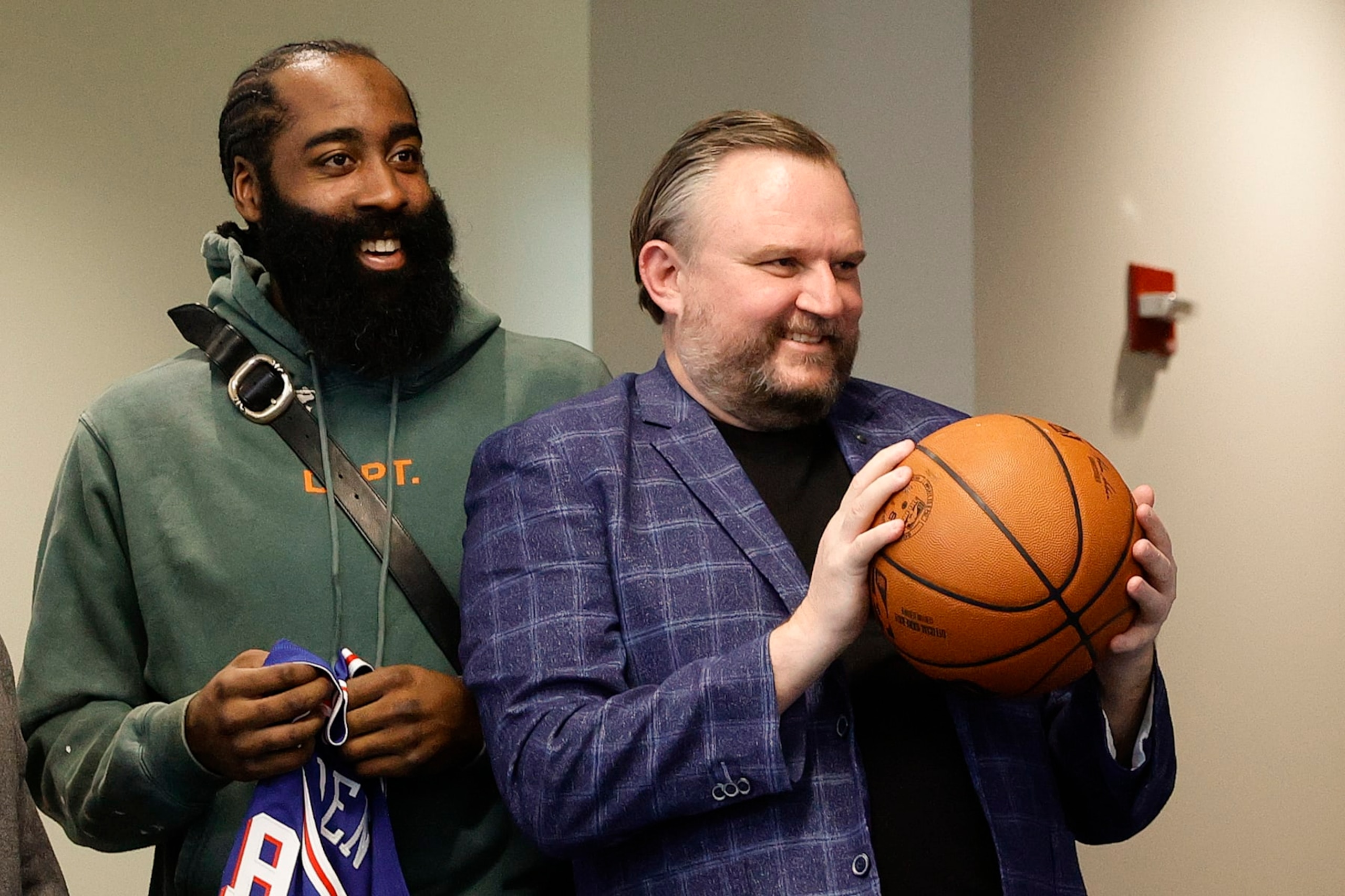 CAMDEN, NEW JERSEY - FEBRUARY 15: James Harden #1 (L) and president of basketball operations Daryl Morey of the Philadelphia 76ers look on during a press conference at the Seventy Sixers Practice Facility on February 15, 2022 in Camden, New Jersey. (Photo by Tim Nwachukwu/Getty Images) NOTE TO USER: User expressly acknowledges and agrees that, by downloading and or using this photograph, User is consenting to the terms and conditions of the Getty Images License Agreement.