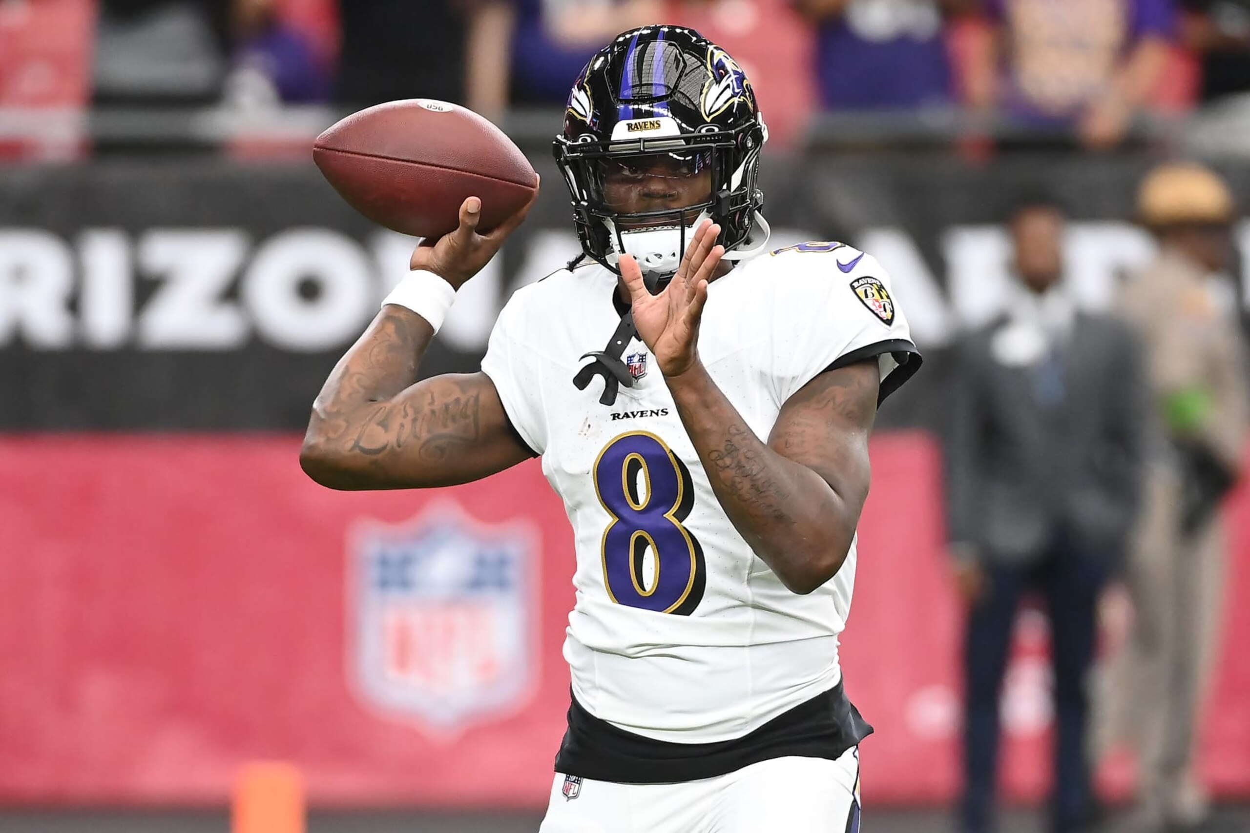 GLENDALE, ARIZONA - OCTOBER 29: Lamar Jackson #8 of the Baltimore Ravens warms up prior to a game against the Arizona Cardinals at State Farm Stadium on October 29, 2023 in Glendale, Arizona. (Photo by Norm Hall/Getty Images) GLENDALE, ARIZONA - OCTOBER 29: Lamar Jackson #8 of the Baltimore Ravens warms up prior to a game against the Arizona Cardinals at State Farm Stadium on October 29, 2023 in Glendale, Arizona. (Photo by Norm Hall/Getty Images)