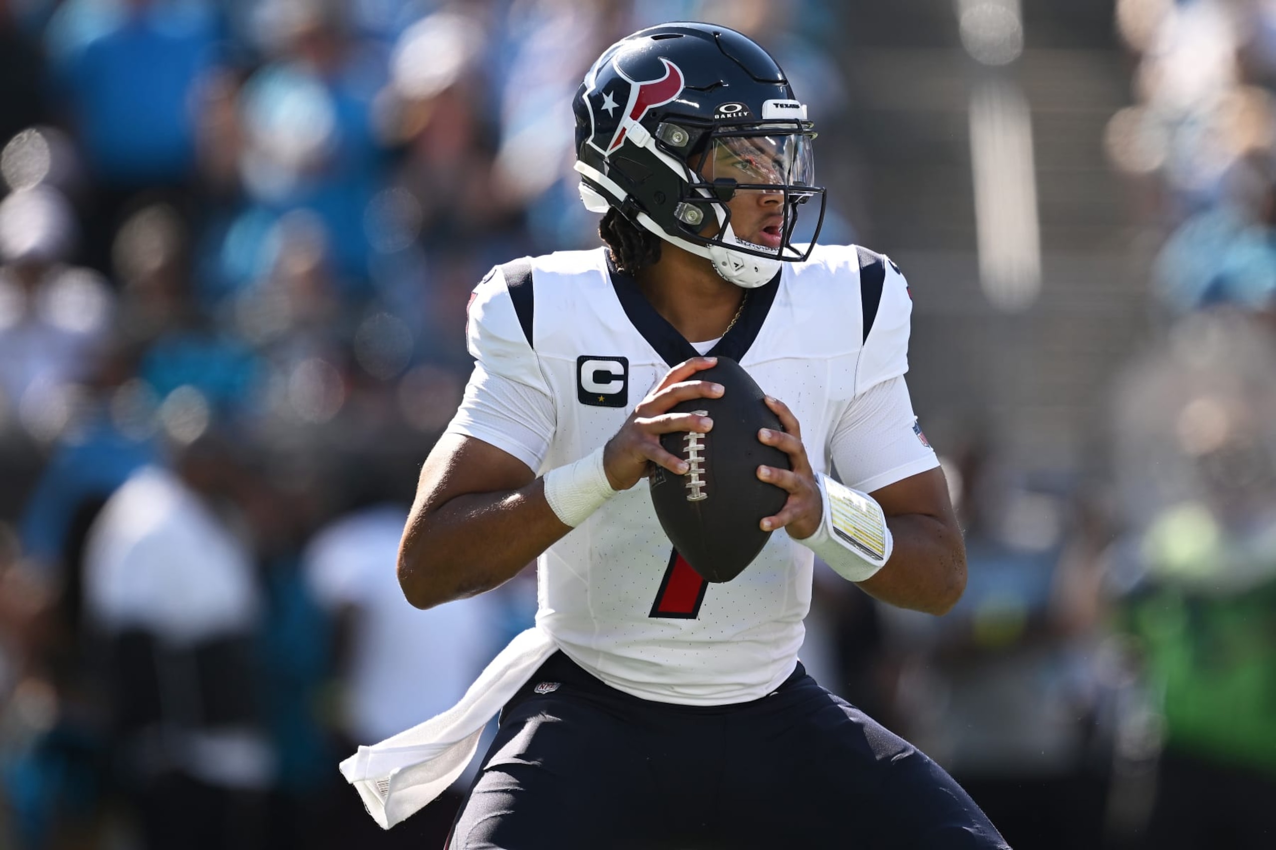 CHARLOTTE, NORTH CAROLINA - OCTOBER 29: C.J. Stroud #7 of the Houston Texans looks to throw a pass during the second quarter of the game against the Carolina Panthers at Bank of America Stadium on October 29, 2023 in Charlotte, North Carolina. (Photo by Grant Halverson/Getty Images) CHARLOTTE, NORTH CAROLINA - OCTOBER 29: C.J. Stroud #7 of the Houston Texans looks to throw a pass during the second quarter of the game against the Carolina Panthers at Bank of America Stadium on October 29, 2023 in Charlotte, North Carolina. (Photo by Grant Halverson/Getty Images)