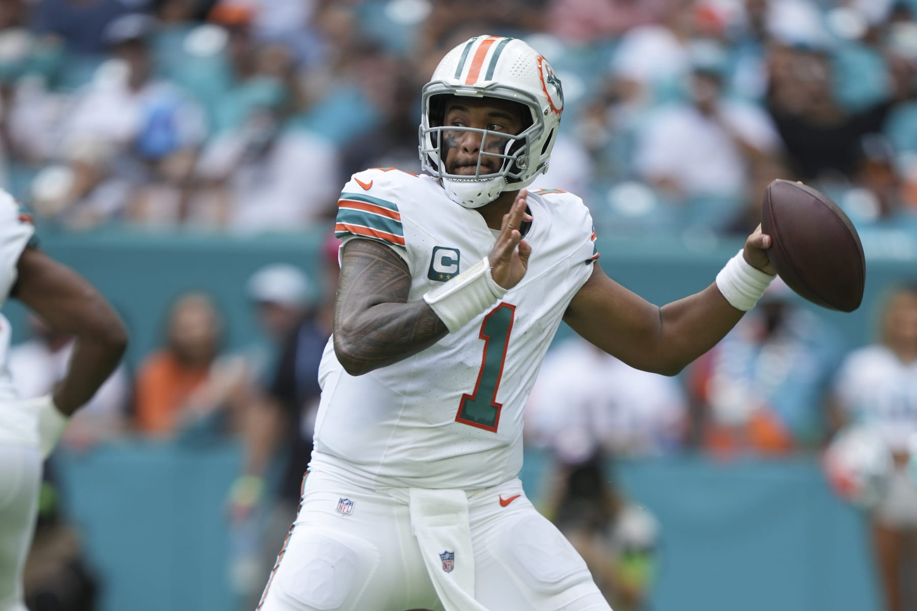 MIAMI GARDENS, FL - OCTOBER 29: Miami Dolphins quarterback Tua Tagovailoa (1) makes a pass attempt during the game between the New England Patriots and the Miami Dolphins on Sunday, October 29, 2023 at Hard Rock Stadium, Miami Gardens, Fla. (Photo by Peter Joneleit/Icon Sportswire via Getty Images)