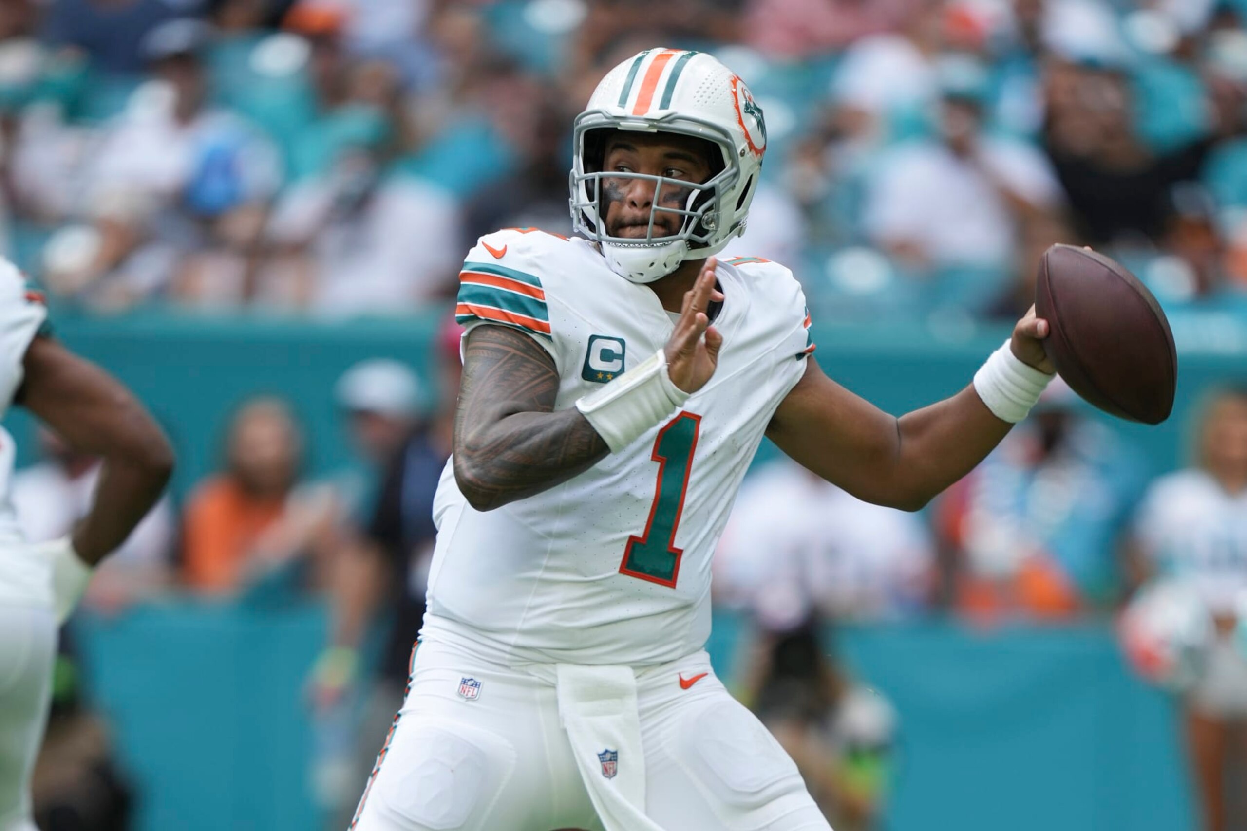 MIAMI GARDENS, FL - OCTOBER 29: Miami Dolphins quarterback Tua Tagovailoa (1) makes a pass attempt during the game between the New England Patriots and the Miami Dolphins on Sunday, October 29, 2023 at Hard Rock Stadium, Miami Gardens, Fla. (Photo by Peter Joneleit/Icon Sportswire via Getty Images) MIAMI GARDENS, FL - OCTOBER 29: Miami Dolphins quarterback Tua Tagovailoa (1) makes a pass attempt during the game between the New England Patriots and the Miami Dolphins on Sunday, October 29, 2023 at Hard Rock Stadium, Miami Gardens, Fla. (Photo by Peter Joneleit/Icon Sportswire via Getty Images)