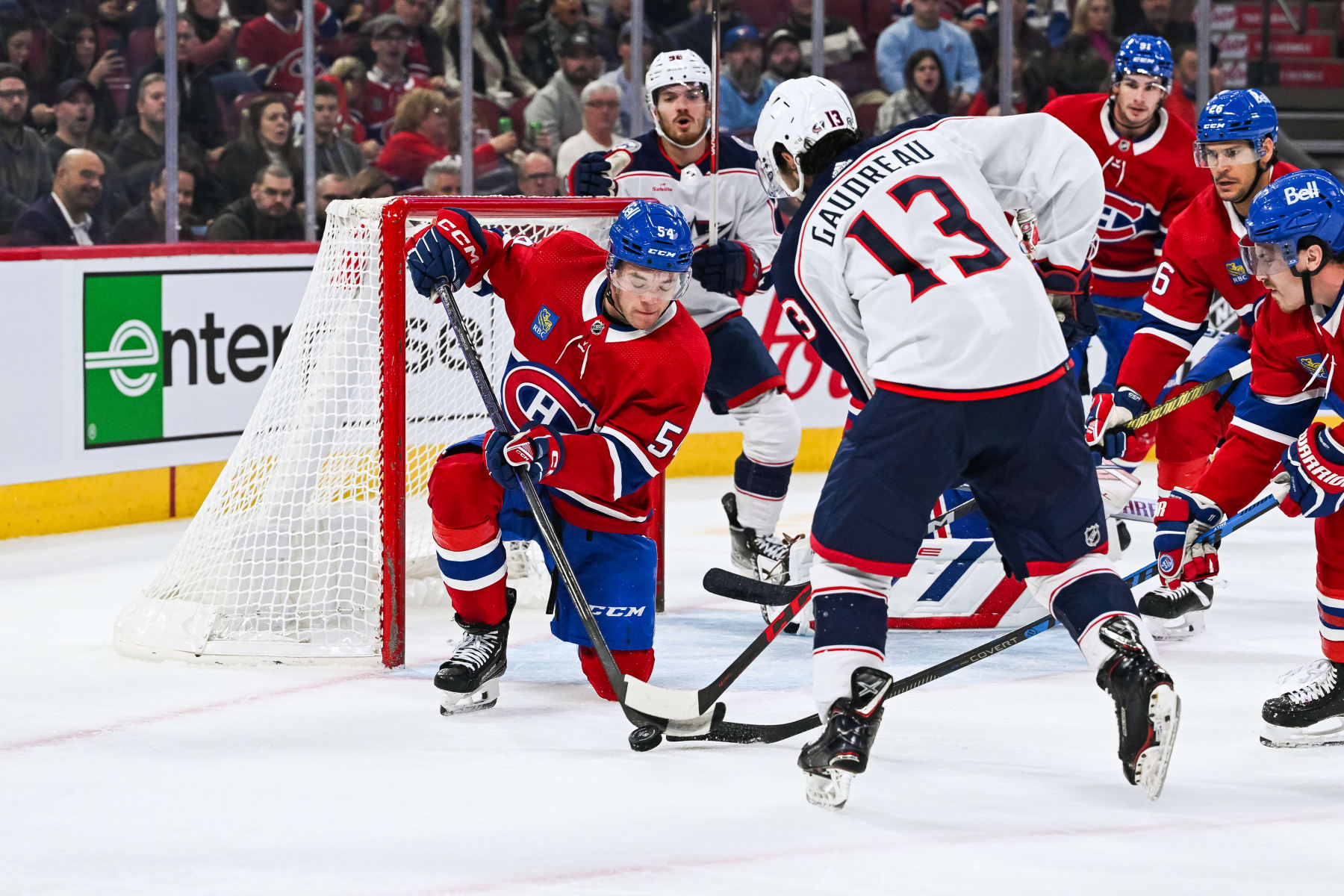 MONTREAL, QC - OCTOBER 26: Montreal Canadiens defenseman Jordan Harris (54) blocks a shot from Columbus Blue Jackets left wing Johnny Gaudreau (13) near the net during the Columbus Blue Jackets versus the Montreal Canadiens game on October 26, 2023, at Bell Centre in Montreal, QC (Photo by David Kirouac/Icon Sportswire via Getty Images)