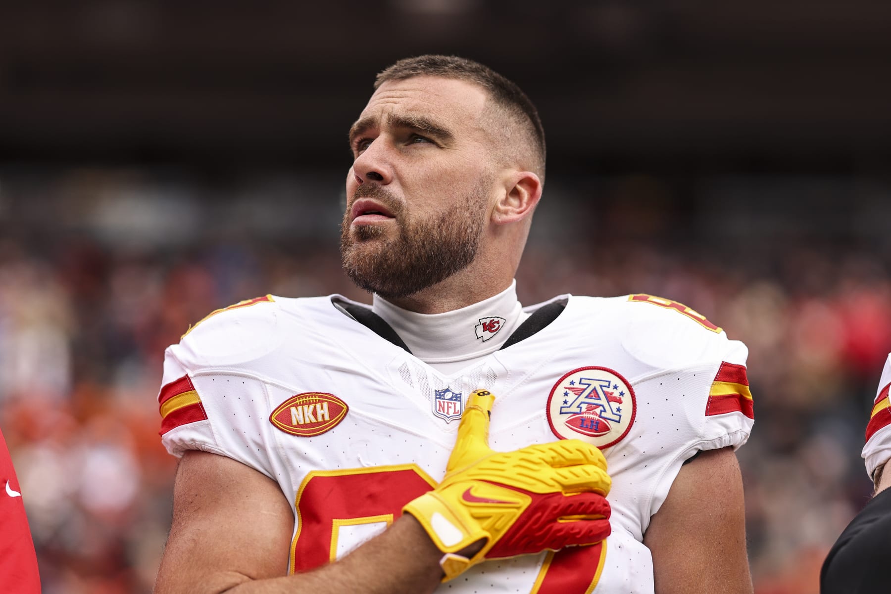 DENVER, COLORADO - OCTOBER 29: Travis Kelce #87 of the Kansas City Chiefs looks on during the national anthem prior to an NFL football game between the Denver Broncos and the Kansas City Chiefs at Empower Field At Mile High on October 29, 2023 in Denver, Colorado. (Photo by Michael Owens/Getty Images)