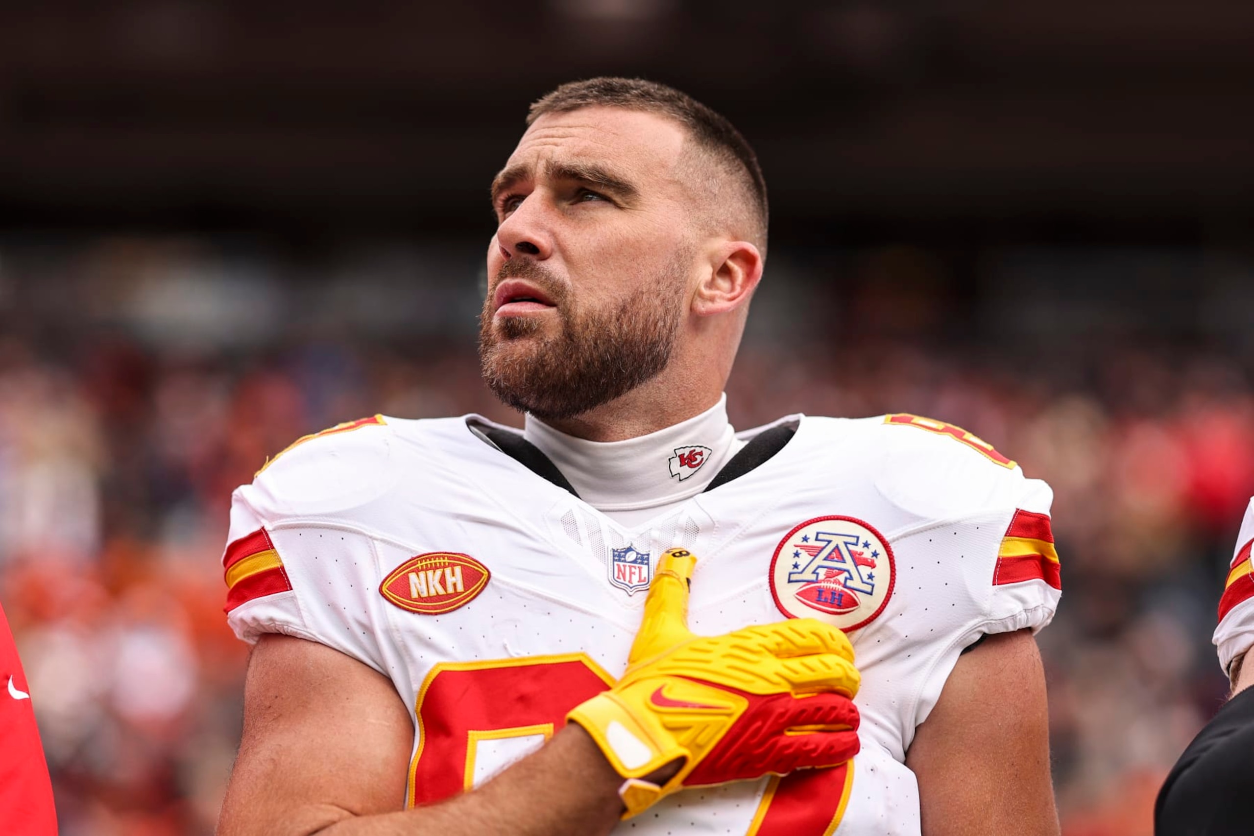 DENVER, COLORADO - OCTOBER 29: Travis Kelce #87 of the Kansas City Chiefs looks on during the national anthem prior to an NFL football game between the Denver Broncos and the Kansas City Chiefs at Empower Field At Mile High on October 29, 2023 in Denver, Colorado. (Photo by Michael Owens/Getty Images) DENVER, COLORADO - OCTOBER 29: Travis Kelce #87 of the Kansas City Chiefs looks on during the national anthem prior to an NFL football game between the Denver Broncos and the Kansas City Chiefs at Empower Field At Mile High on October 29, 2023 in Denver, Colorado. (Photo by Michael Owens/Getty Images)