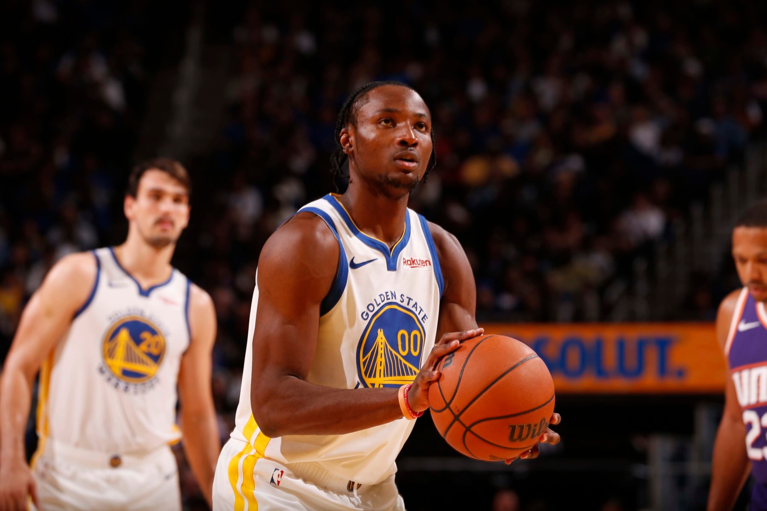 SAN FRANCISCO, CA - OCTOBER 24: Jonathan Kuminga #00 of the Golden State Warriors shoots a free throw during the game against the Phoenix Suns on October 24, 2023 at Chase Center in San Francisco, California. NOTE TO USER: User expressly acknowledges and agrees that, by downloading and or using this photograph, user is consenting to the terms and conditions of Getty Images License Agreement. Mandatory Copyright Notice: Copyright 2023 NBAE (Photo by Jed Jacobsohn/NBAE via Getty Images) SAN FRANCISCO, CA - OCTOBER 24: Jonathan Kuminga #00 of the Golden State Warriors shoots a free throw during the game against the Phoenix Suns on October 24, 2023 at Chase Center in San Francisco, California. NOTE TO USER: User expressly acknowledges and agrees that, by downloading and or using this photograph, user is consenting to the terms and conditions of Getty Images License Agreement. Mandatory Copyright Notice: Copyright 2023 NBAE (Photo by Jed Jacobsohn/NBAE via Getty Images)