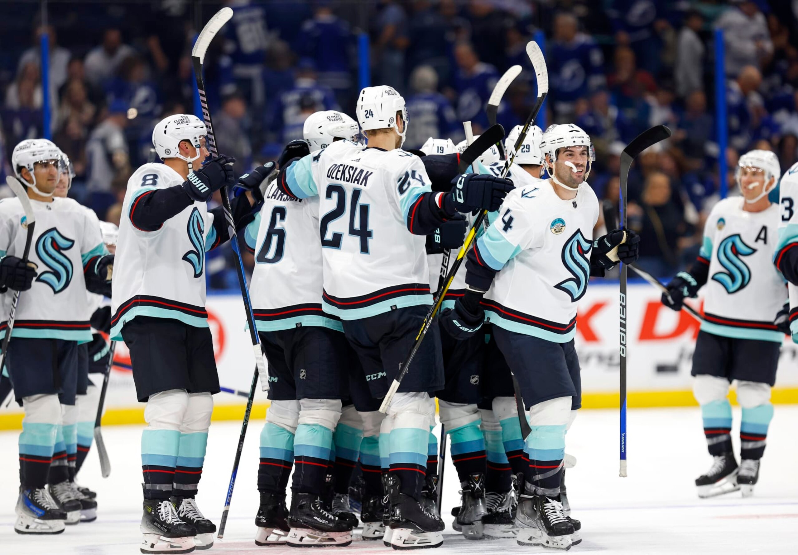 TAMPA, FLORIDA - OCTOBER 30: Jared McCann #19 of the Seattle Kraken celebrates a goal in overtime during a game against the Tampa Bay Lightning at Amalie Arena on October 30, 2023 in Tampa, Florida. (Photo by Mike Ehrmann/Getty Images) TAMPA, FLORIDA - OCTOBER 30: Jared McCann #19 of the Seattle Kraken celebrates a goal in overtime during a game against the Tampa Bay Lightning at Amalie Arena on October 30, 2023 in Tampa, Florida. (Photo by Mike Ehrmann/Getty Images)