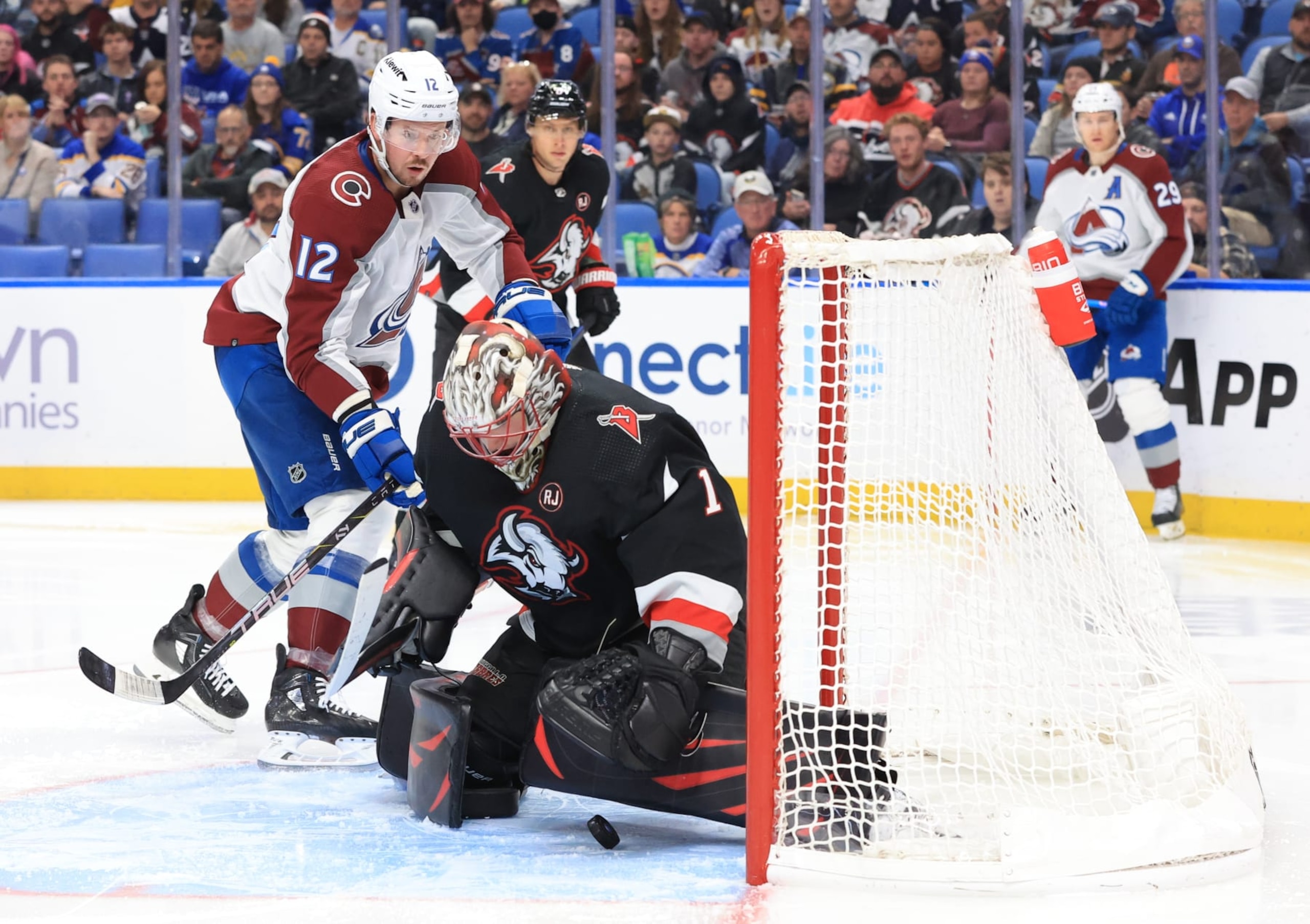 BUFFALO, NEW YORK - OCTOBER 29: Ukko-Pekka Luukkonen #1 of the Buffalo Sabres covers the puck up against Ryan Johansen #12 of the Colorado Avalanche during an NHL game on October 29, 2023 at KeyBank Center in Buffalo, New York. (Photo by Bill Wippert/NHLI via Getty Images) BUFFALO, NEW YORK - OCTOBER 29: Ukko-Pekka Luukkonen #1 of the Buffalo Sabres covers the puck up against Ryan Johansen #12 of the Colorado Avalanche during an NHL game on October 29, 2023 at KeyBank Center in Buffalo, New York. (Photo by Bill Wippert/NHLI via Getty Images)