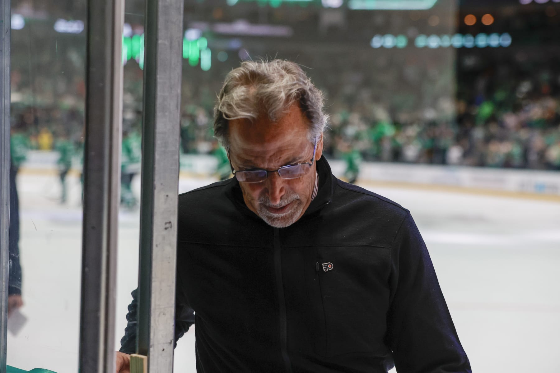 DALLAS, TX - OCTOBER 21: The Philadelphia Flyers head coach John Tortorella leaves the ice after the game between the Dallas Stars and the Philadelphia Flyers on October 21, 2023 at American Airlines Center in Dallas, Texas. (Photo by Matthew Pearce/Icon Sportswire via Getty Images)