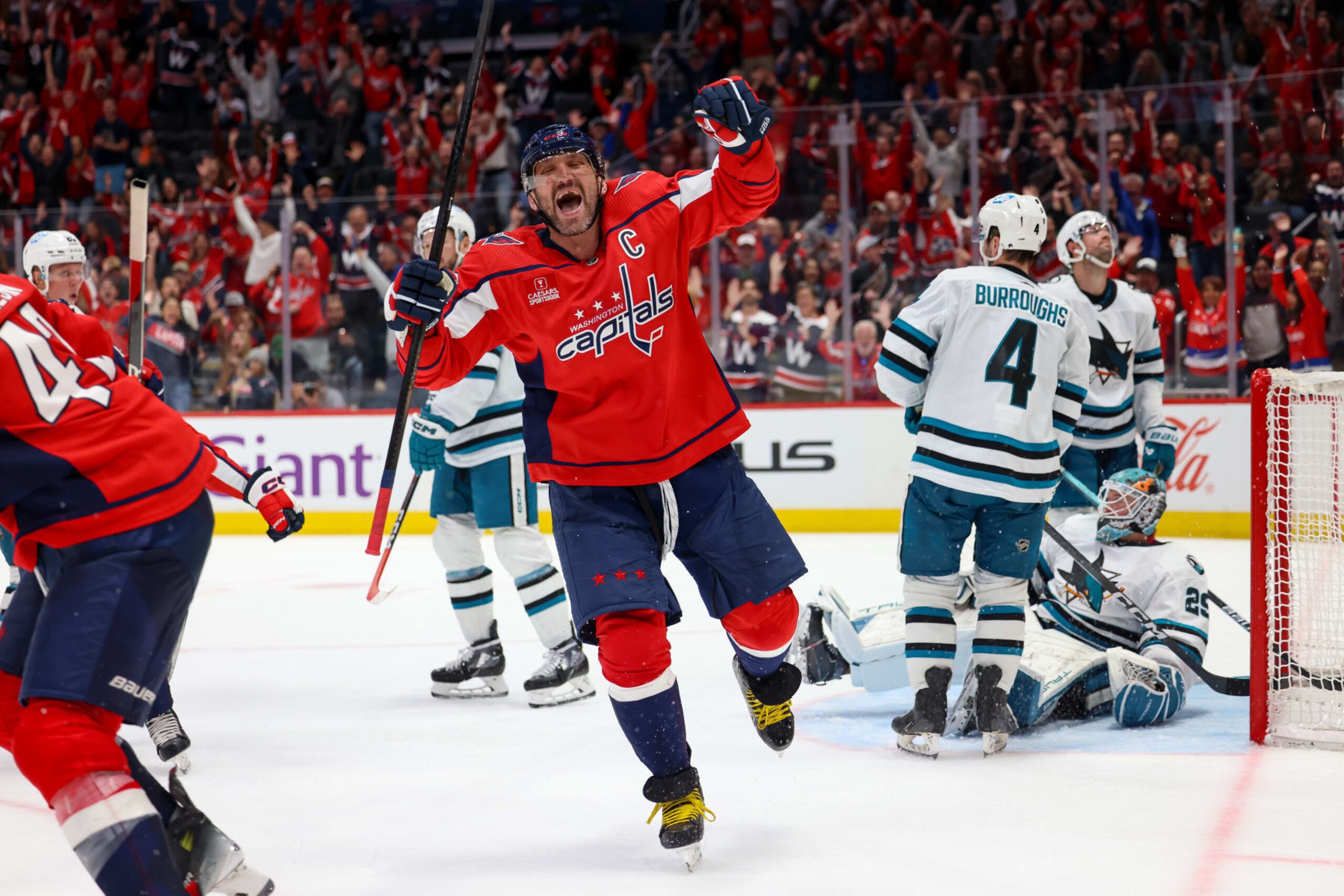 WASHINGTON, DC - OCTOBER 29: Alex Ovechkin #8 of the Washington Capitals celebrates after assisting on a goal by Tom Wilson #43 against the San Jose Sharks at Capital One Arena on October 29, 2023 in Washington, D.C. (Photo by John McCreary/NHLI via Getty Images) WASHINGTON, DC - OCTOBER 29: Alex Ovechkin #8 of the Washington Capitals celebrates after assisting on a goal by Tom Wilson #43 against the San Jose Sharks at Capital One Arena on October 29, 2023 in Washington, D.C. (Photo by John McCreary/NHLI via Getty Images)