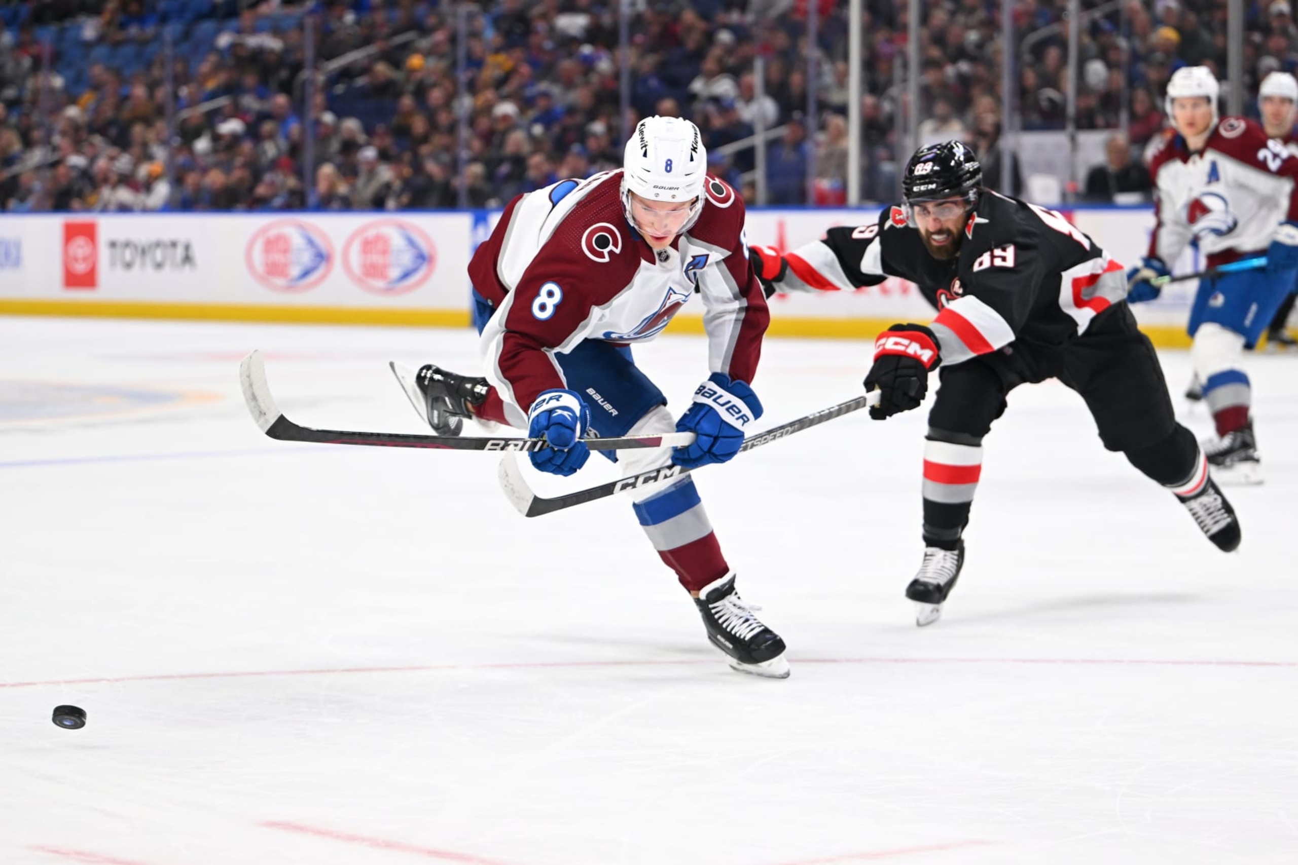 BUFFALO, NEW YORK - OCTOBER 29: Alex Tuch #89 of the Buffalo Sabres defends against Cale Makar #8 of the Colorado Avalanche during an NHL game on October 29, 2023 at KeyBank Center in Buffalo, New York. (Photo by Joe Hrycych/NHLI via Getty Images) BUFFALO, NEW YORK - OCTOBER 29: Alex Tuch #89 of the Buffalo Sabres defends against Cale Makar #8 of the Colorado Avalanche during an NHL game on October 29, 2023 at KeyBank Center in Buffalo, New York. (Photo by Joe Hrycych/NHLI via Getty Images)