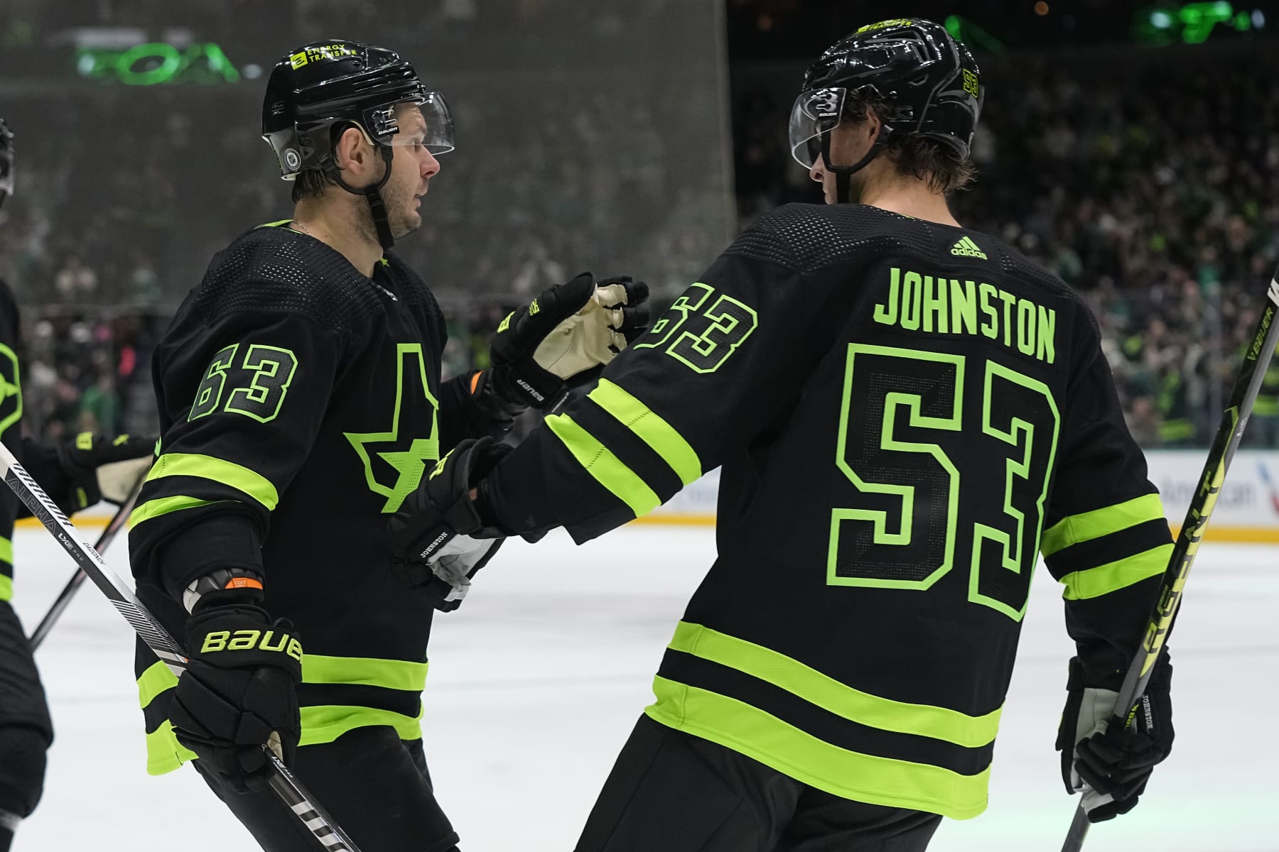 DALLAS, TEXAS - OCTOBER 30: Evgenii Dadonov #63 and Wyatt Johnston #53 of the Dallas Stars celebrates with a goal during the third period against the Columbus Blue Jackets at American Airlines Center on October 30, 2023 in Dallas, Texas. (Photo by Sam Hodde/Getty Images)