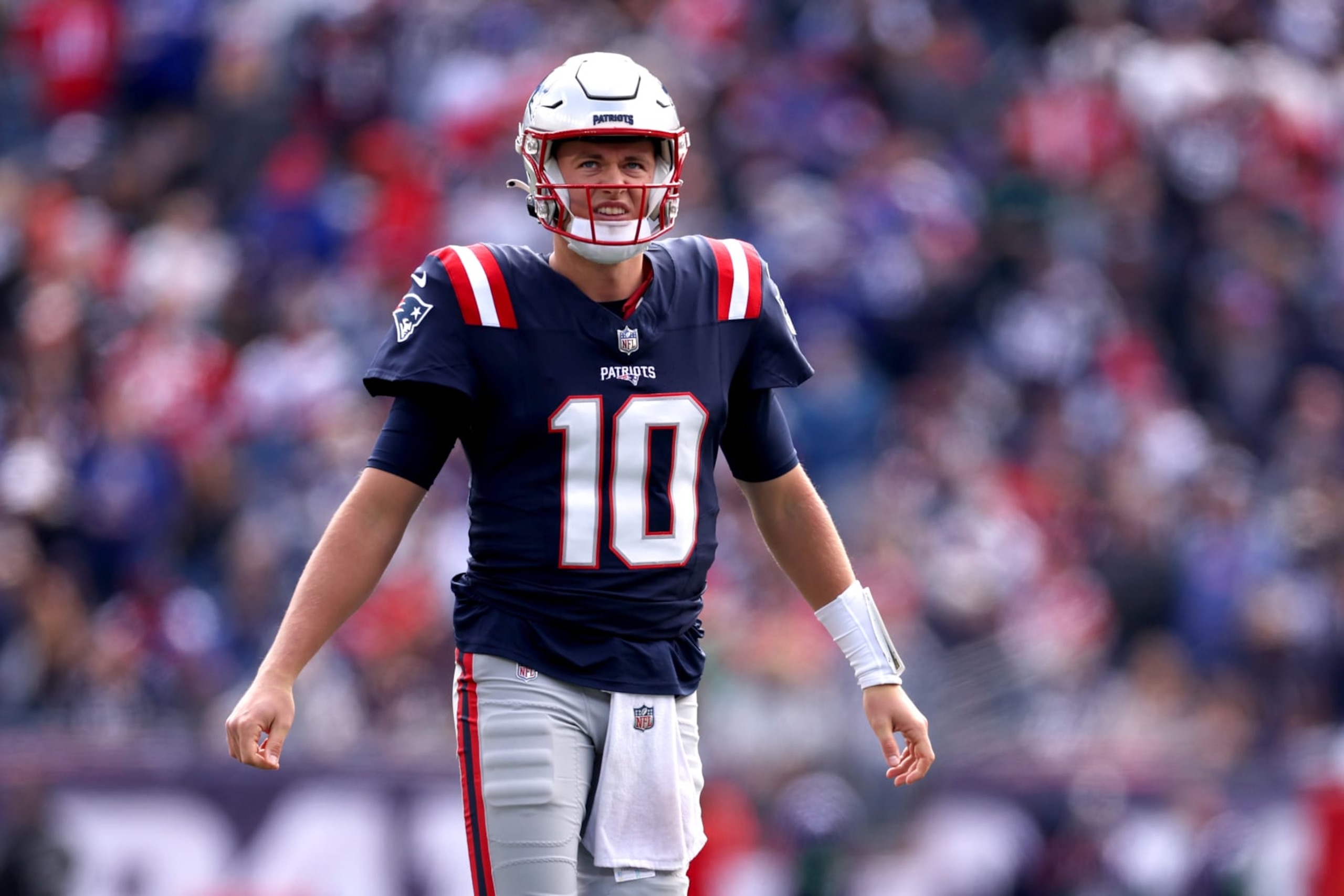FOXBOROUGH, MASSACHUSETTS - OCTOBER 22: Mac Jones #10 of the New England Patriots looks on in the first half of the game against the Buffalo Bills at Gillette Stadium on October 22, 2023 in Foxborough, Massachusetts. (Photo by Maddie Meyer/Getty Images) FOXBOROUGH, MASSACHUSETTS - OCTOBER 22: Mac Jones #10 of the New England Patriots looks on in the first half of the game against the Buffalo Bills at Gillette Stadium on October 22, 2023 in Foxborough, Massachusetts. (Photo by Maddie Meyer/Getty Images)