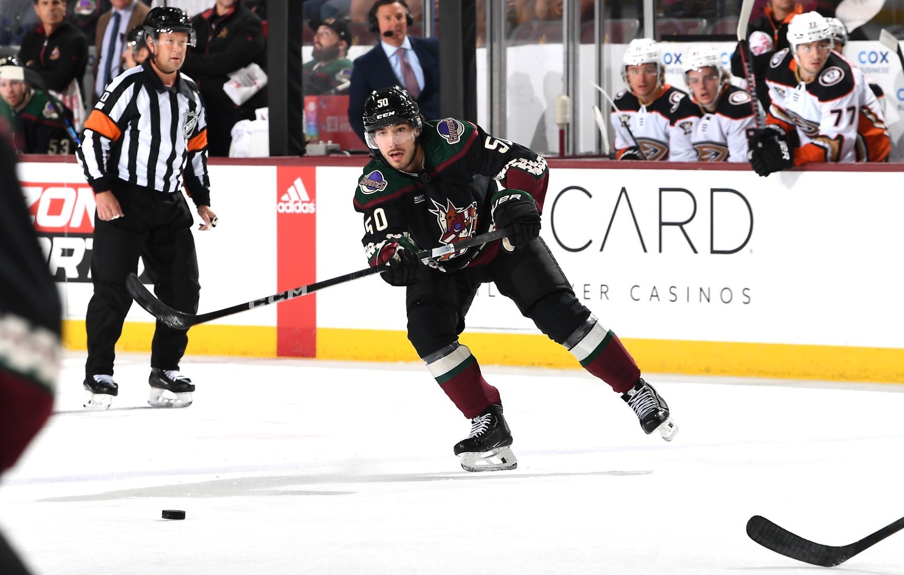 TEMPE, ARIZONA - OCTOBER 21: Sean Durzi #50 of the Arizona Coyotes passes the puck against the Anaheim Ducks at Mullett Arena on October 21, 2023 in Tempe, Arizona. (Photo by Norm Hall/NHLI via Getty Images)