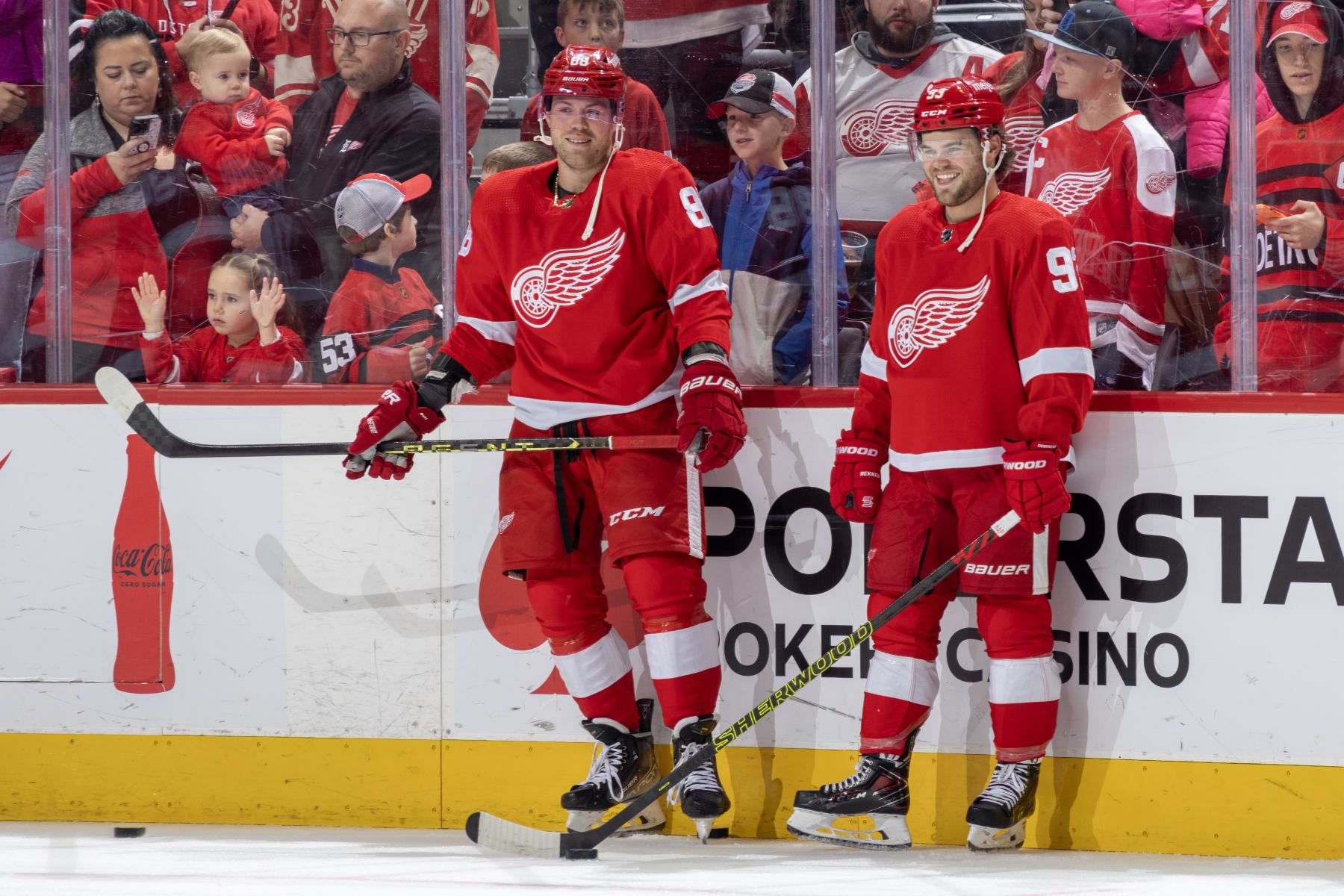 DETROIT, MI - OCTOBER 22: Daniel Sprong #88 and Alex DeBrincat #93 of the Detroit Red Wings have some fun in warm ups before the game against the Calgary Flames at Little Caesars Arena on October 22, 2023 in Detroit, Michigan. Detroit defeated Calgary 6-2. (Photo by Dave Reginek/NHLI via Getty Images)