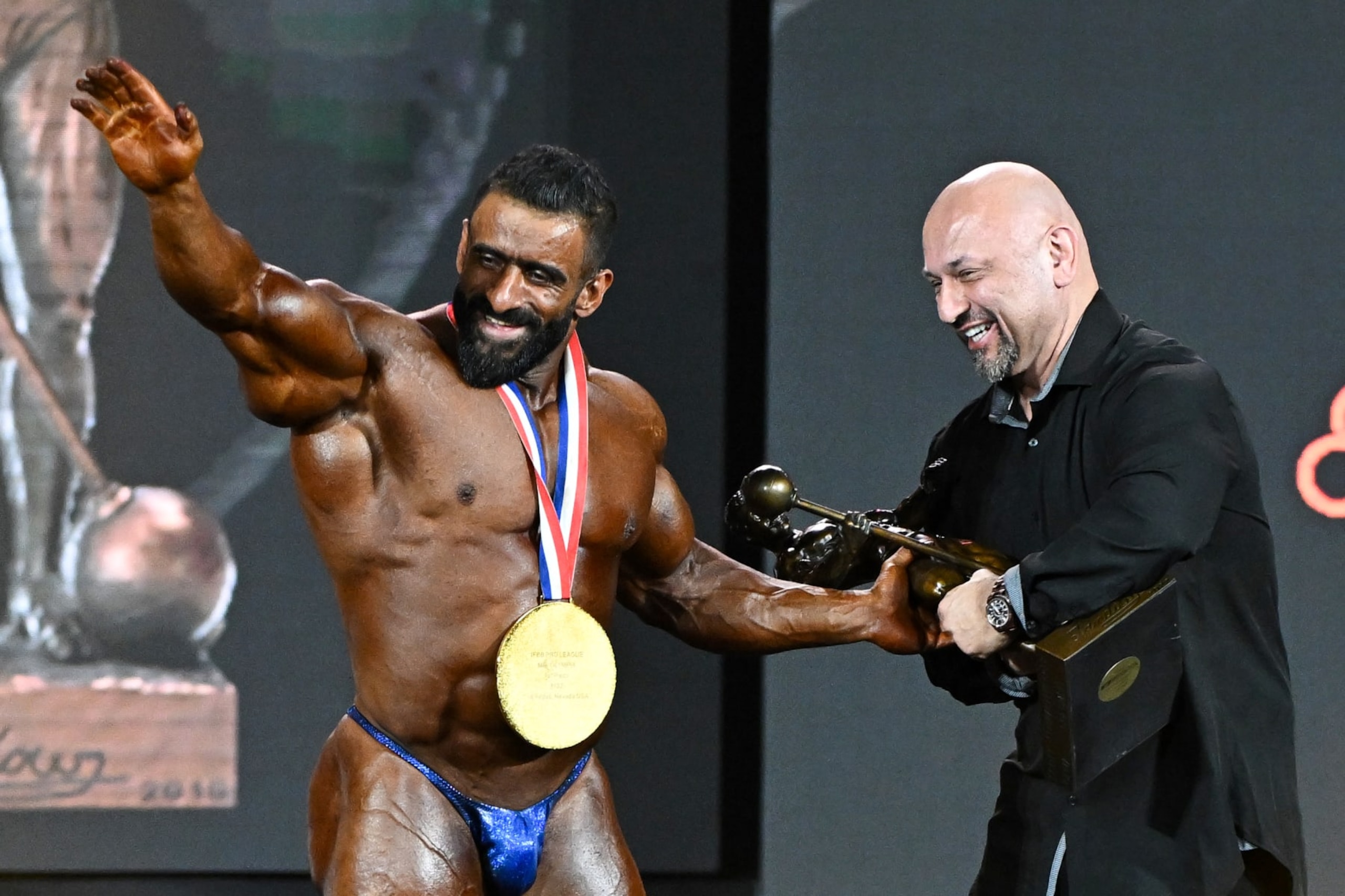 LAS VEGAS, NEVADA - DECEMBER 17, 2022: Hadi Choopan celebrates winning the Mr. Olympia event during the Olympia Fitness & Performance weekend at Planet Hollywood Resort and Casino on December 17, 2022 in Las Vegas, Nevada. (Photo by Chris Bernacchi/Diamond Images via Getty Images)
