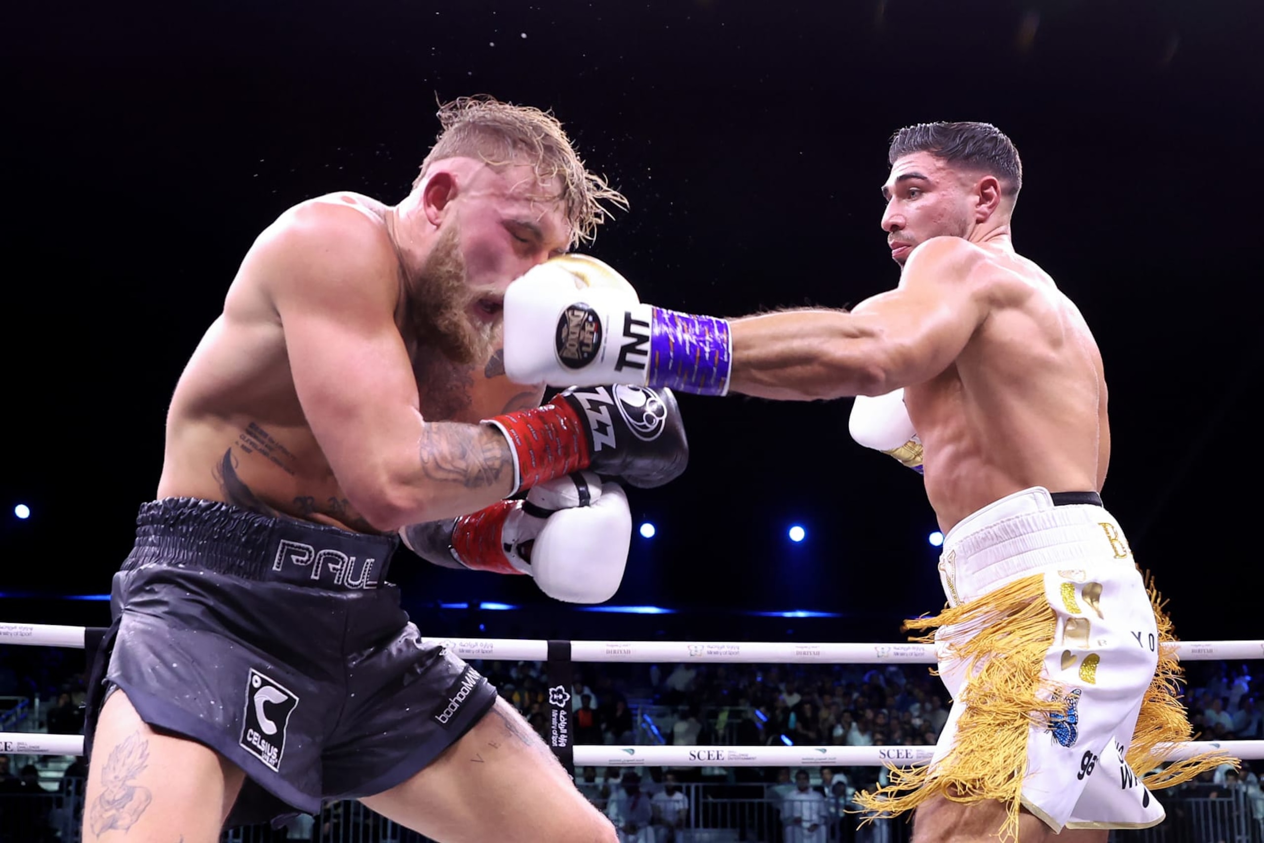 RIYADH, SAUDI ARABIA - FEBRUARY 26: Tommy Fury punches Jake Paul during the Cruiserweight Title fight between Jake Paul and Tommy Fury at the Diriyah Arena on February 26, 2023 in Riyadh, Saudi Arabia. (Photo by Francois Nel/Getty Images)