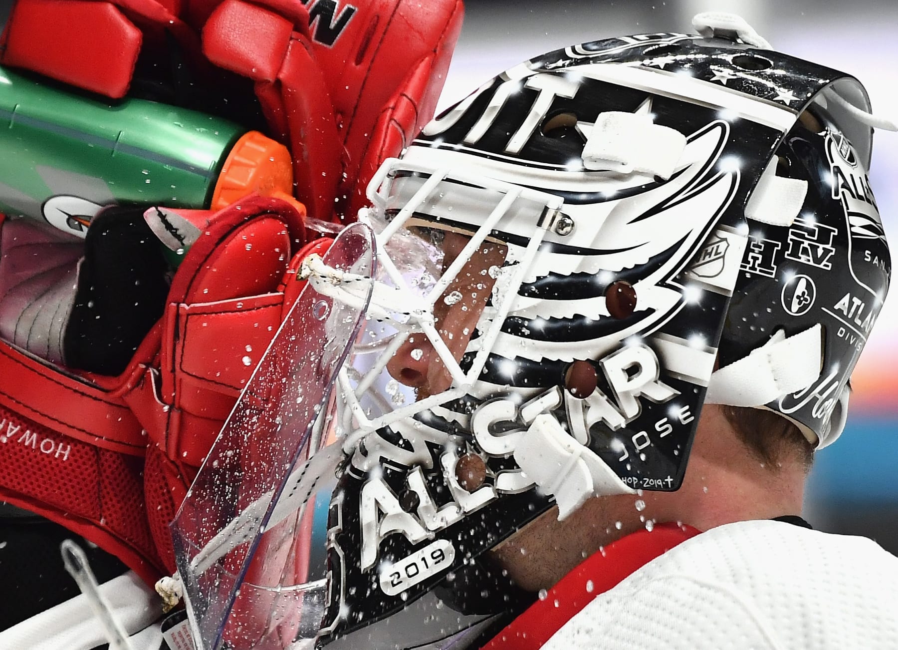 SAN JOSE, CA - JANUARY 26: Goaltender Jimmy Howard #35 of the Detroit Red Wings sprays water through his mask onto his face during the 2019 Honda NHL All-Star Game at SAP Center on January 26, 2019 in San Jose, California.  (Photo by Brandon Magnus/NHLI via Getty Images)