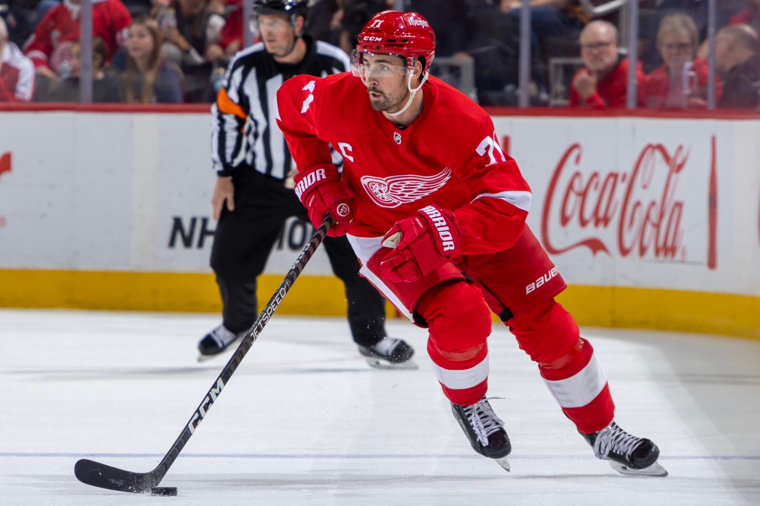 DETROIT, MI - OCTOBER 26: Dylan Larkin #71 of the Detroit Red Wings skates up ice with the puck against the Winnipeg Jets during the third period at Little Caesars Arena on October 26, 2023 in Detroit, Michigan. Winnipeg defeated Detroit 4-1. (Photo by Dave Reginek/NHLI via Getty Images) DETROIT, MI - OCTOBER 26: Dylan Larkin #71 of the Detroit Red Wings skates up ice with the puck against the Winnipeg Jets during the third period at Little Caesars Arena on October 26, 2023 in Detroit, Michigan. Winnipeg defeated Detroit 4-1. (Photo by Dave Reginek/NHLI via Getty Images)