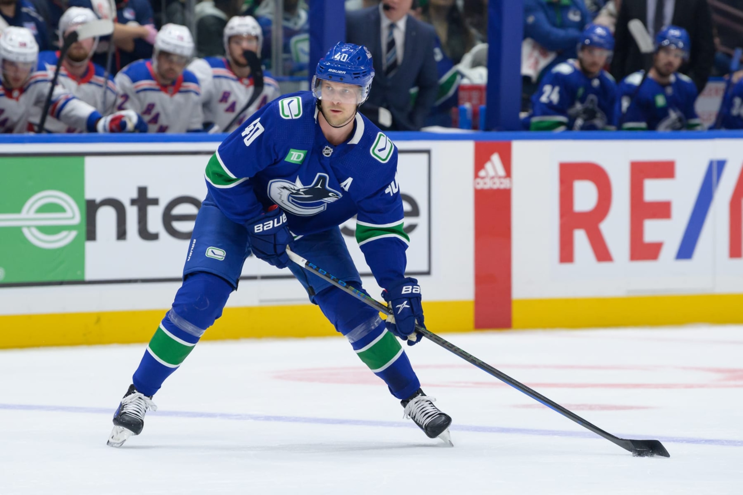VANCOUVER, CANADA - OCTOBER 28: Elias Pettersson #40 of the Vancouver Canucks skates with the puck during the first period of their NHL game against the New York Rangers at Rogers Arena on October 28, 2023 in Vancouver, British Columbia, Canada. (Photo by Derek Cain/Getty Images) VANCOUVER, CANADA - OCTOBER 28: Elias Pettersson #40 of the Vancouver Canucks skates with the puck during the first period of their NHL game against the New York Rangers at Rogers Arena on October 28, 2023 in Vancouver, British Columbia, Canada. (Photo by Derek Cain/Getty Images)