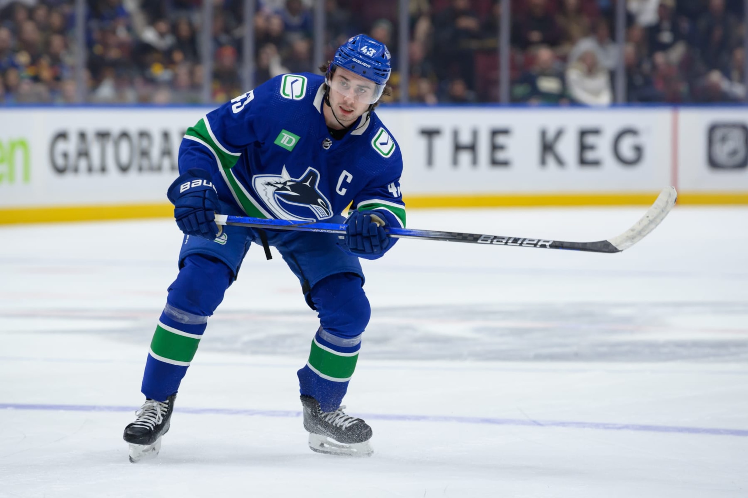 VANCOUVER, CANADA - OCTOBER 28: Quinn Hughes #43 of the Vancouver Canucks passes the puck during the first period of their NHL game against the New York Rangers at Rogers Arena on October 28, 2023 in Vancouver, British Columbia, Canada. (Photo by Derek Cain/Getty Images) VANCOUVER, CANADA - OCTOBER 28: Quinn Hughes #43 of the Vancouver Canucks passes the puck during the first period of their NHL game against the New York Rangers at Rogers Arena on October 28, 2023 in Vancouver, British Columbia, Canada. (Photo by Derek Cain/Getty Images)