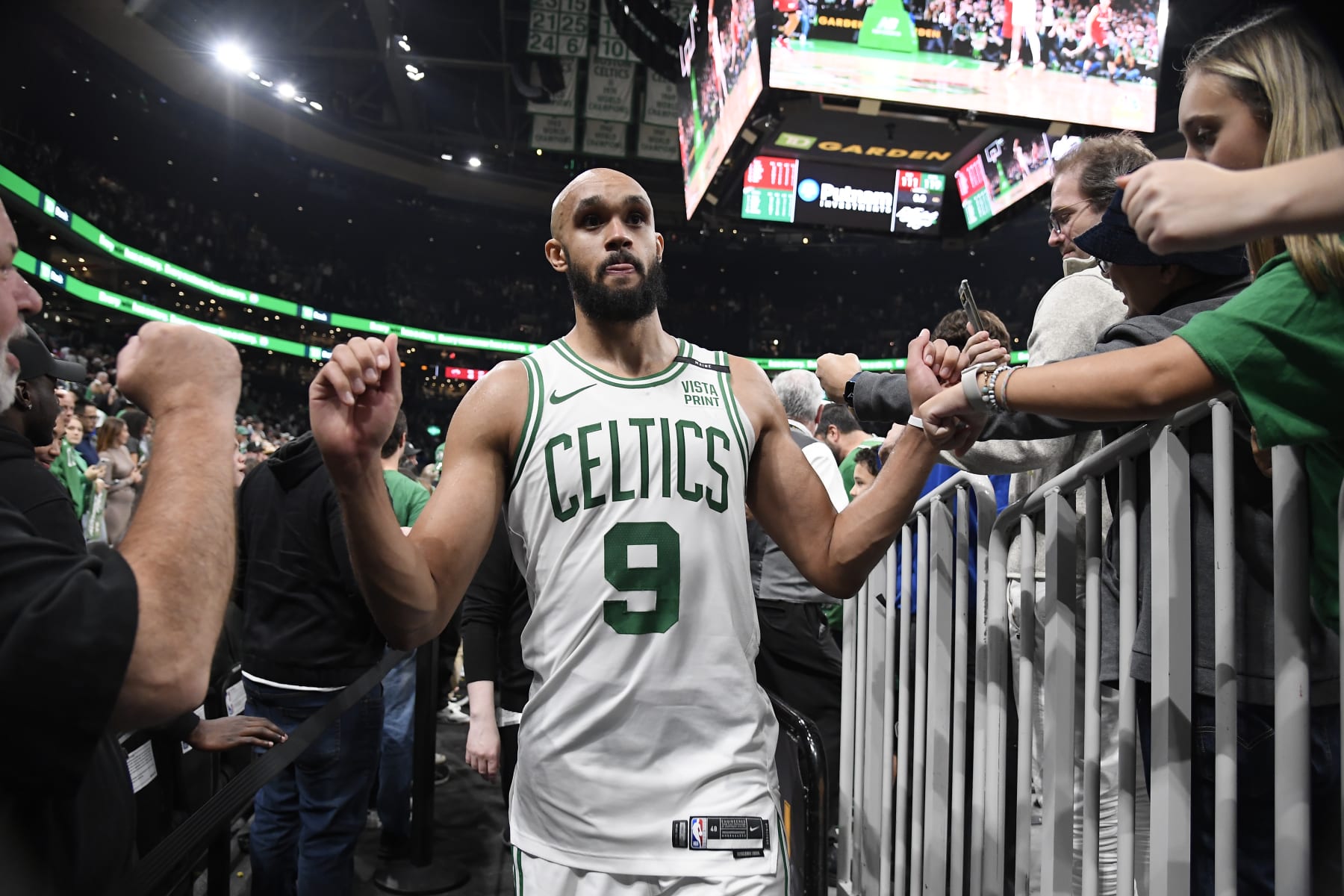 BOSTON, MA - OCTOBER 27: Derrick White #9 of the Boston Celtics greets fans after the game against the Miami Heat on October 27, 2023 at the TD Garden in Boston, Massachusetts. NOTE TO USER: User expressly acknowledges and agrees that, by downloading and or using this photograph, User is consenting to the terms and conditions of the Getty Images License Agreement. Mandatory Copyright Notice: Copyright 2023 NBAE (Photo by Brian Babineau/NBAE via Getty Images) BOSTON, MA - OCTOBER 27: Derrick White #9 of the Boston Celtics greets fans after the game against the Miami Heat on October 27, 2023 at the TD Garden in Boston, Massachusetts. NOTE TO USER: User expressly acknowledges and agrees that, by downloading and or using this photograph, User is consenting to the terms and conditions of the Getty Images License Agreement. Mandatory Copyright Notice: Copyright 2023 NBAE (Photo by Brian Babineau/NBAE via Getty Images)