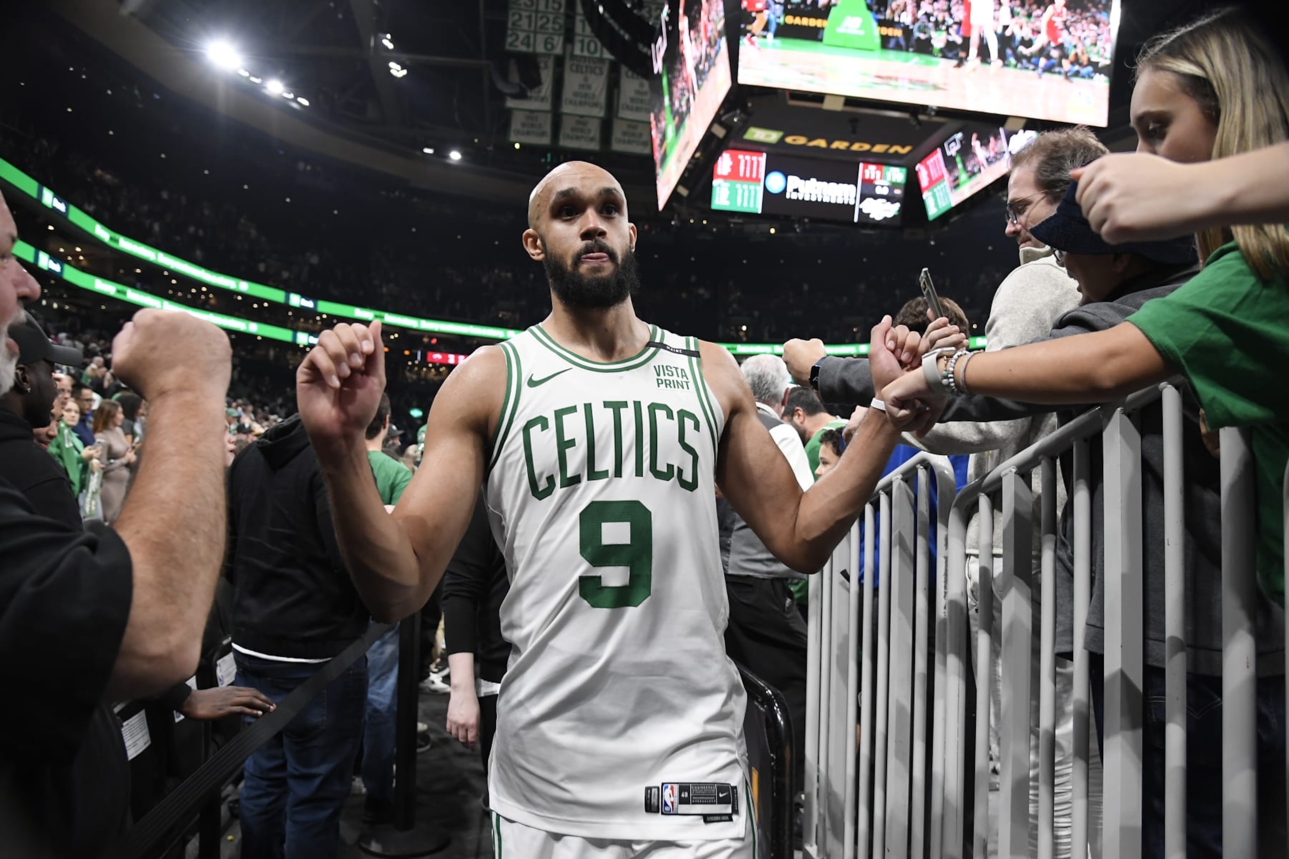 BOSTON, MA - OCTOBER 27: Derrick White #9 of the Boston Celtics greets fans after the game against the Miami Heat on October 27, 2023 at the TD Garden in Boston, Massachusetts. NOTE TO USER: User expressly acknowledges and agrees that, by downloading and or using this photograph, User is consenting to the terms and conditions of the Getty Images License Agreement. Mandatory Copyright Notice: Copyright 2023 NBAE  (Photo by Brian Babineau/NBAE via Getty Images)