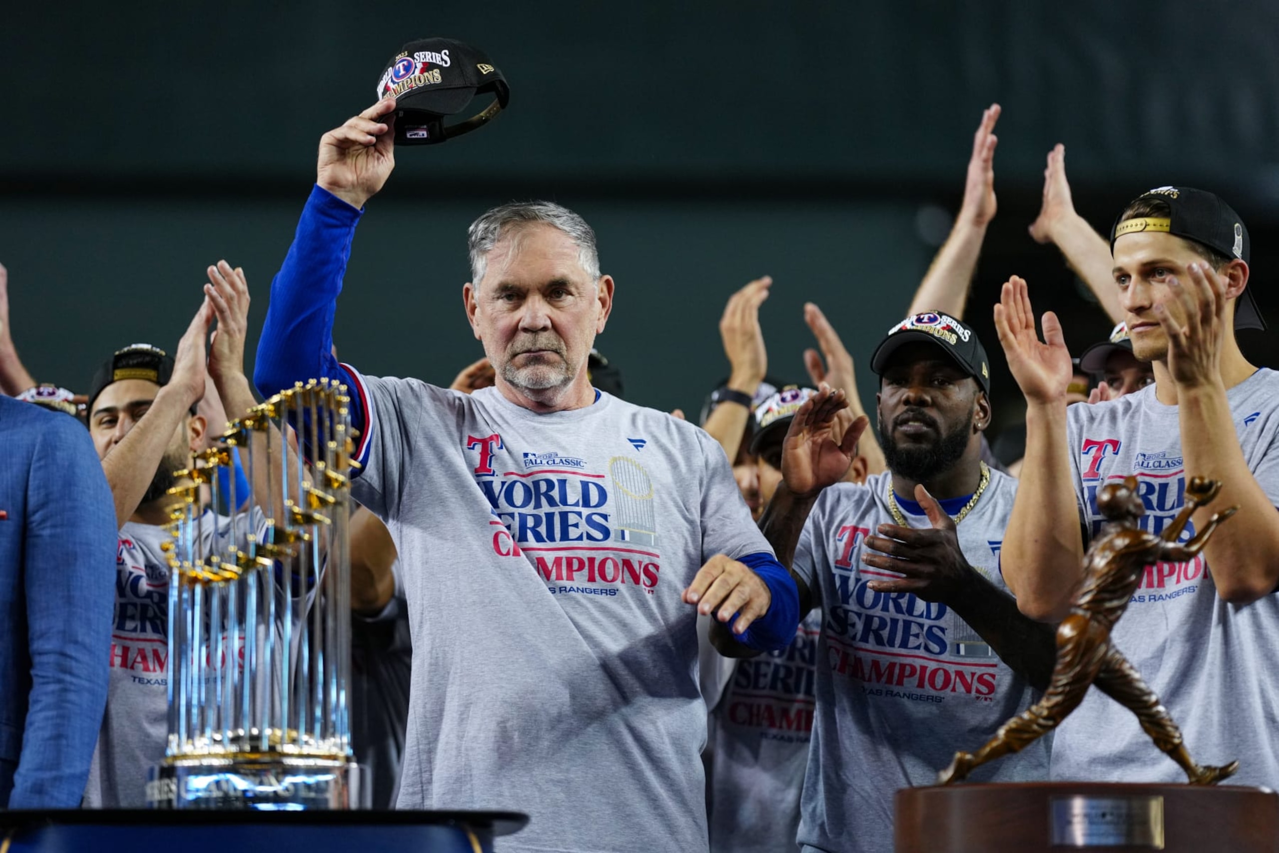 PHOENIX, AZ - NOVEMBER 01: Manager Bruce Bochy #15 of the Texas Rangers acknowledges the crowd during the trophy presentation after Game 5 of the 2023 World Series between the Texas Rangers and the Arizona Diamondbacks at Chase Field on Wednesday, November 1, 2023 in Phoenix, Arizona. The Texas Rangers won the World Series 5-0. (Photo by Daniel Shirey/MLB Photos via Getty Images)