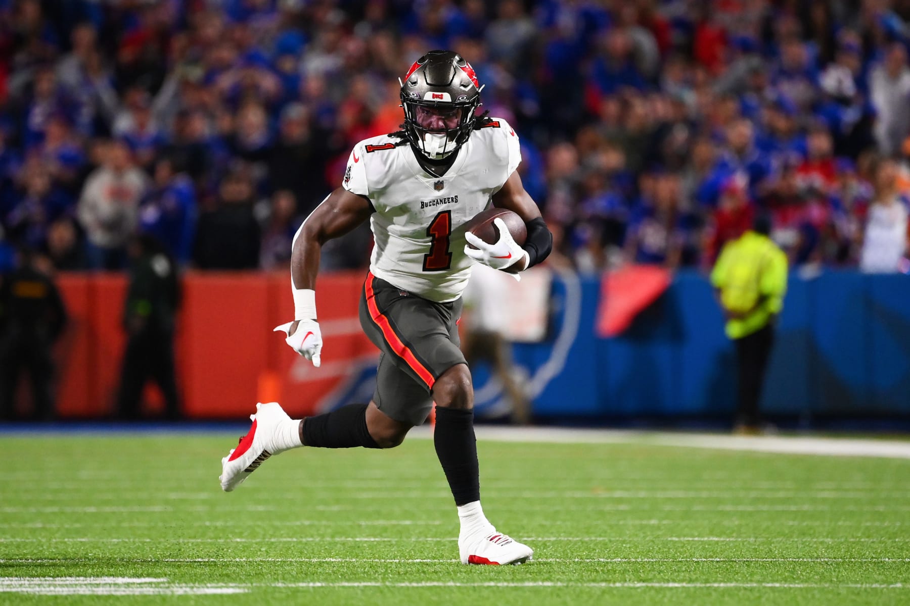 ORCHARD PARK, NEW YORK - OCTOBER 26: Rachaad White #1 of the Tampa Bay Buccaneers carries the ball against the Buffalo Bills during the first half of the game at Highmark Stadium on October 26, 2023 in Orchard Park, New York. (Photo by Rich Barnes/Getty Images)