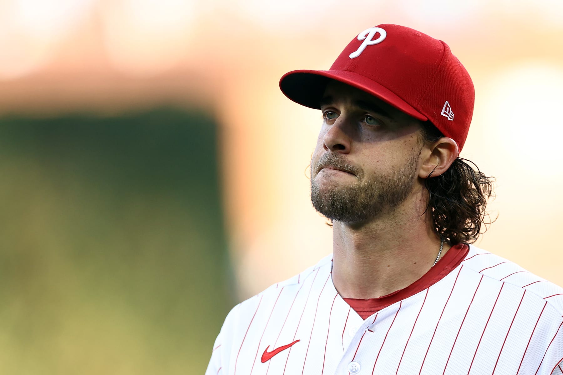 PHILADELPHIA, PENNSYLVANIA - OCTOBER 23: Aaron Nola #27 of the Philadelphia Phillies looks on before Game Six of the Championship Series against the Arizona Diamondbacks at Citizens Bank Park on October 23, 2023 in Philadelphia, Pennsylvania. (Photo by Tim Nwachukwu/Getty Images)