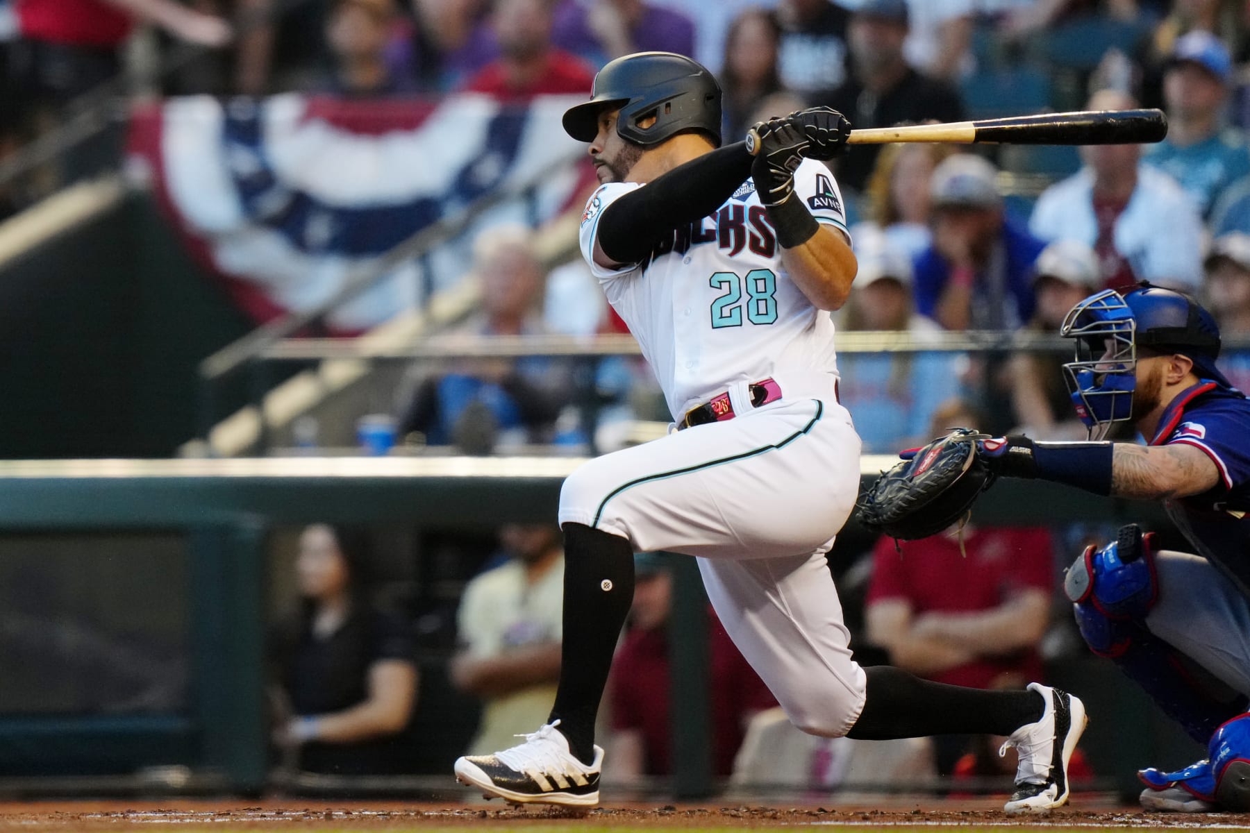 PHOENIX, AZ - OCTOBER 30:  Tommy Pham #28 of the Arizona Diamondbacks singles in the second inning during Game 3 of the 2023 World Series between the Texas Rangers and the Arizona Diamondbacks at Chase Field on Monday, October 30, 2023 in Phoenix, Arizona. (Photo by Daniel Shirey/MLB Photos via Getty Images)