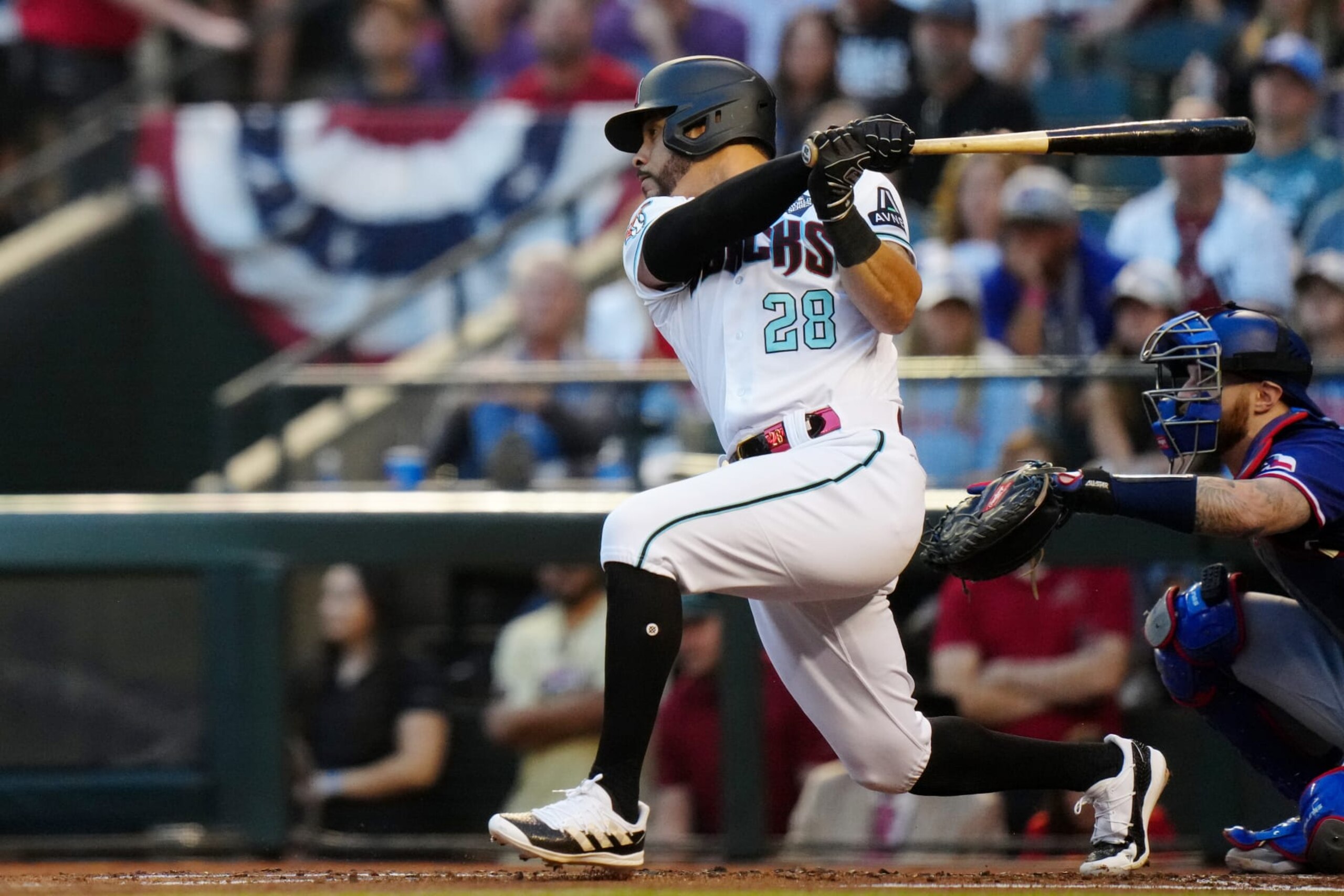 PHOENIX, AZ - OCTOBER 30:  Tommy Pham #28 of the Arizona Diamondbacks singles in the second inning during Game 3 of the 2023 World Series between the Texas Rangers and the Arizona Diamondbacks at Chase Field on Monday, October 30, 2023 in Phoenix, Arizona. (Photo by Daniel Shirey/MLB Photos via Getty Images)