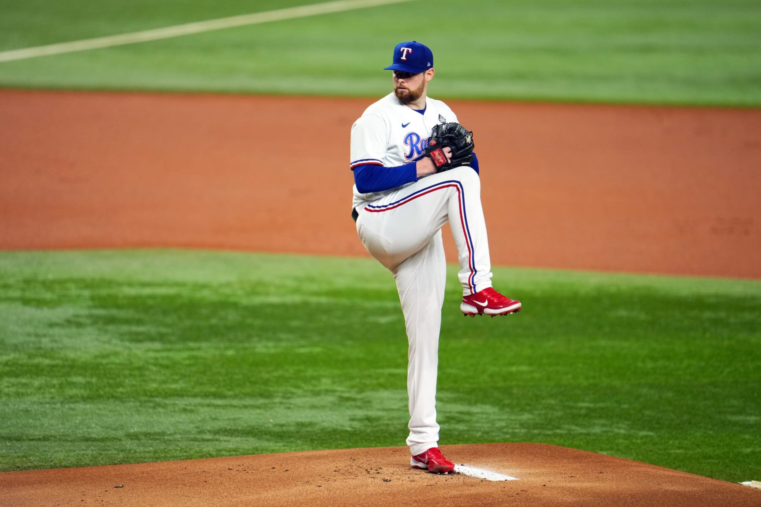 ARLINGTON, TX - OCTOBER 28: Jordan Montgomery #52 of the Texas Rangers pitches in the first inning during Game 2 of the 2023 World Series between the Arizona Diamondbacks and the Texas Rangers at Globe Life Field on Saturday, October 28, 2023 in Arlington, Texas. (Photo by Cooper Neill/MLB Photos via Getty Images)