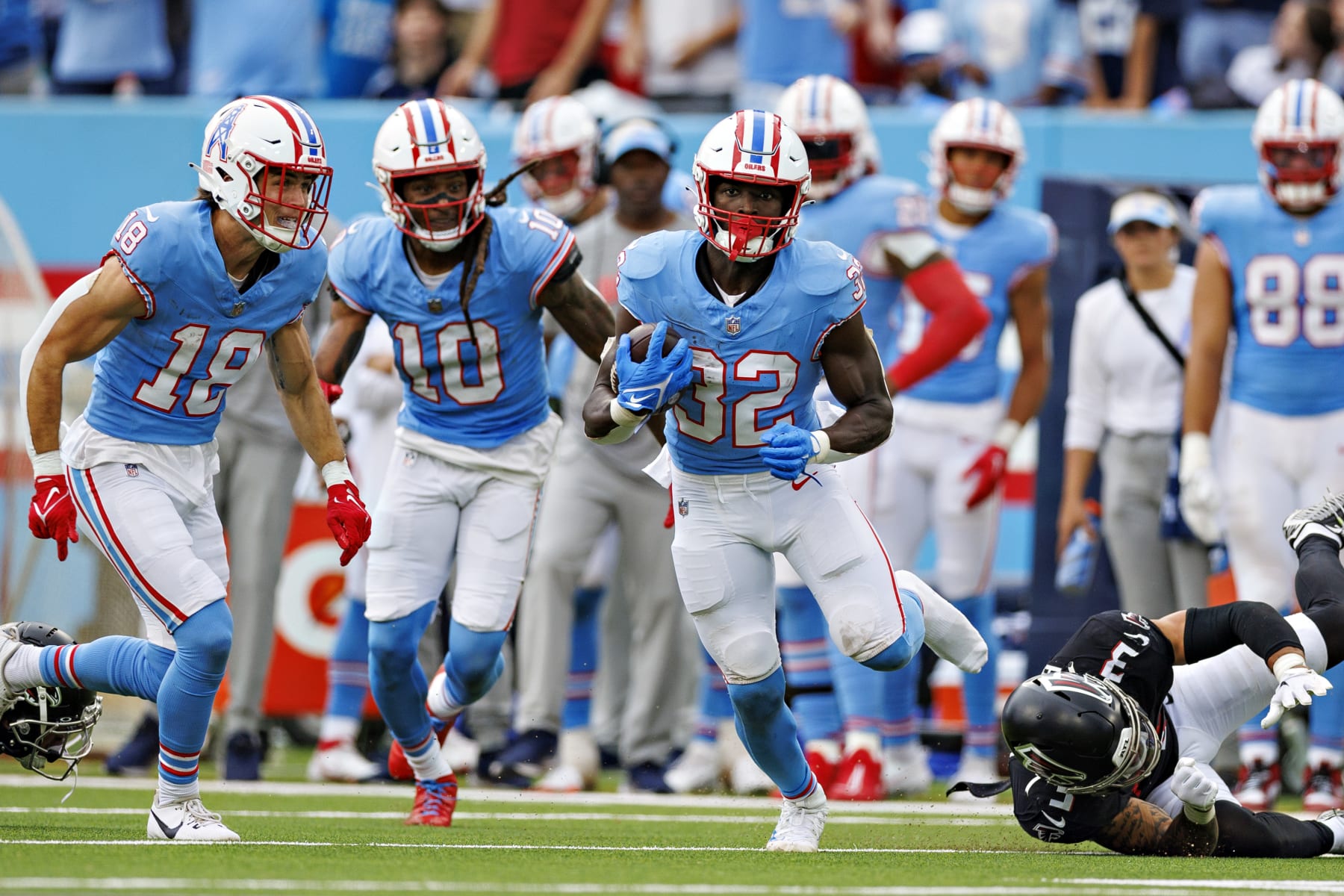 NASHVILLE, TENNESSEE - OCTOBER 29:  Tyjae Spears #32 of the Tennessee Titans runs the ball during the game against the Atlanta Falcons at Nissan Stadium on October 29, 2023 in Nashville, Tennessee. The Titans defeated the Falcons 28-23. (Photo by Wesley Hitt/Getty Images)