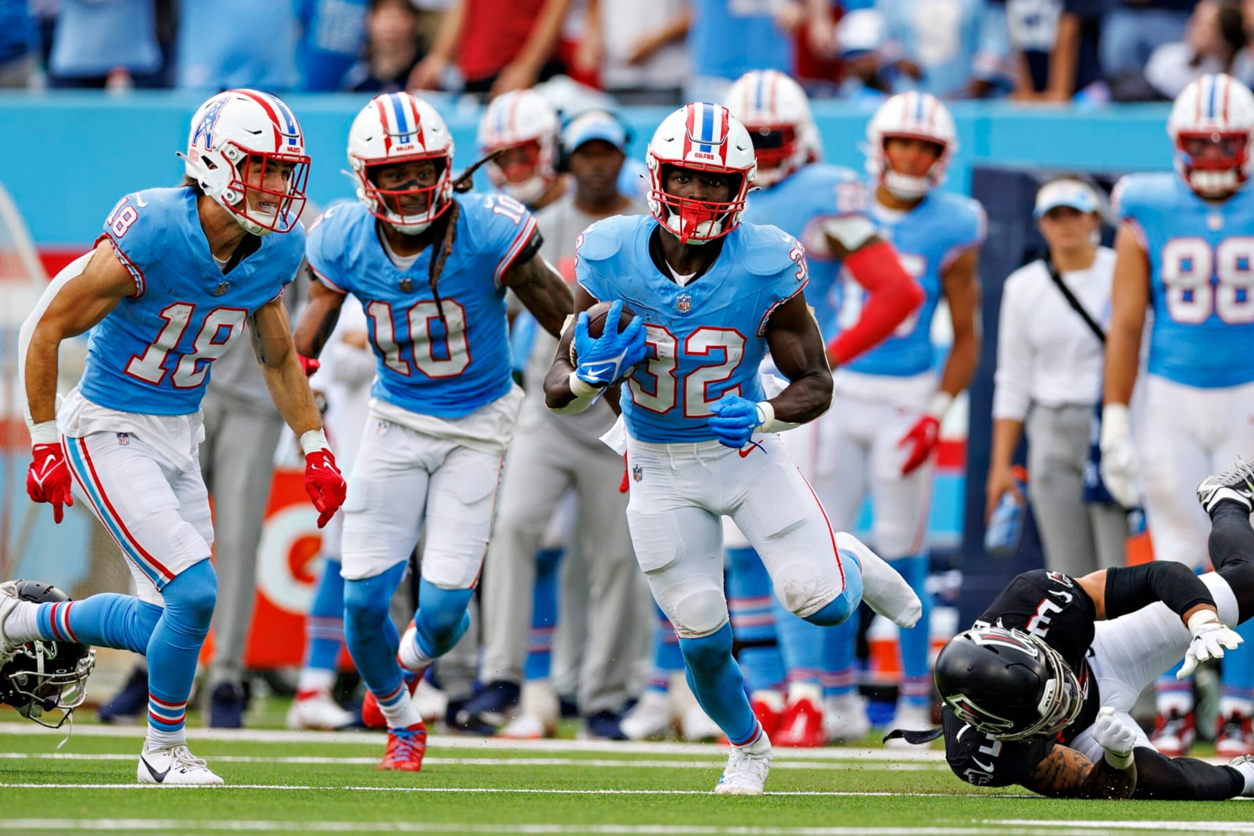 NASHVILLE, TENNESSEE - OCTOBER 29:  Tyjae Spears #32 of the Tennessee Titans runs the ball during the game against the Atlanta Falcons at Nissan Stadium on October 29, 2023 in Nashville, Tennessee. The Titans defeated the Falcons 28-23. (Photo by Wesley Hitt/Getty Images)
