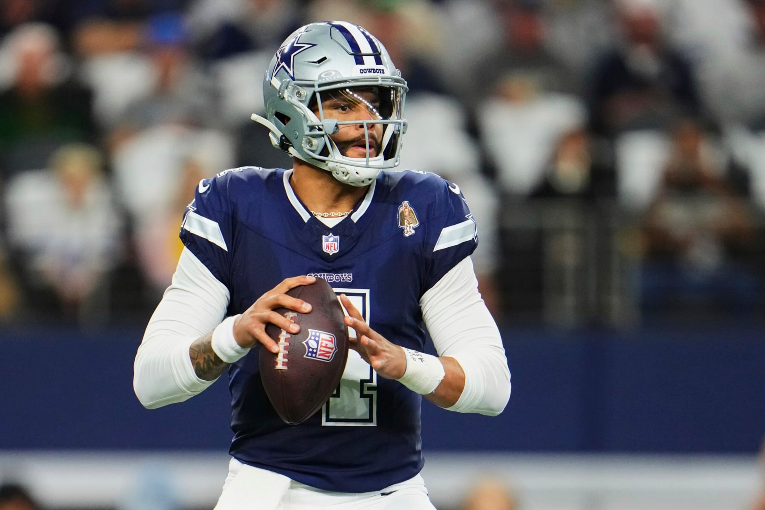 ARLINGTON, TX - OCTOBER 29: Dak Prescott #4 of the Dallas Cowboys drops back to pass against the Los Angeles Rams at AT&T Stadium on October 29, 2023 during the first half in Arlington, Texas. (Photo by Cooper Neill/Getty Images) ARLINGTON, TX - OCTOBER 29: Dak Prescott #4 of the Dallas Cowboys drops back to pass against the Los Angeles Rams at AT&T Stadium on October 29, 2023 during the first half in Arlington, Texas. (Photo by Cooper Neill/Getty Images)