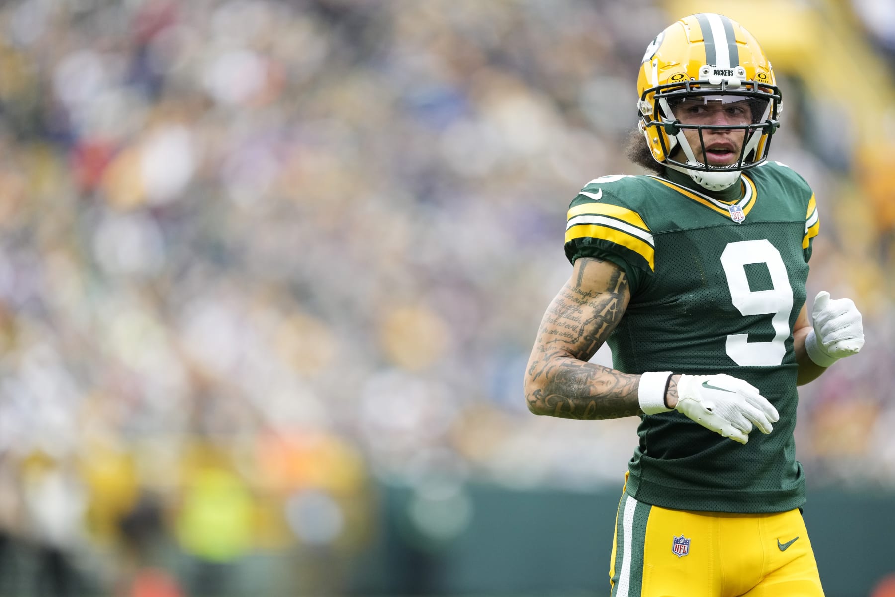 GREEN BAY, WISCONSIN - OCTOBER 29: Christian Watson #9 of the Green Bay Packers in action in the second half against the Minnesota Vikings at Lambeau Field on October 29, 2023 in Green Bay, Wisconsin. (Photo by Patrick McDermott/Getty Images)