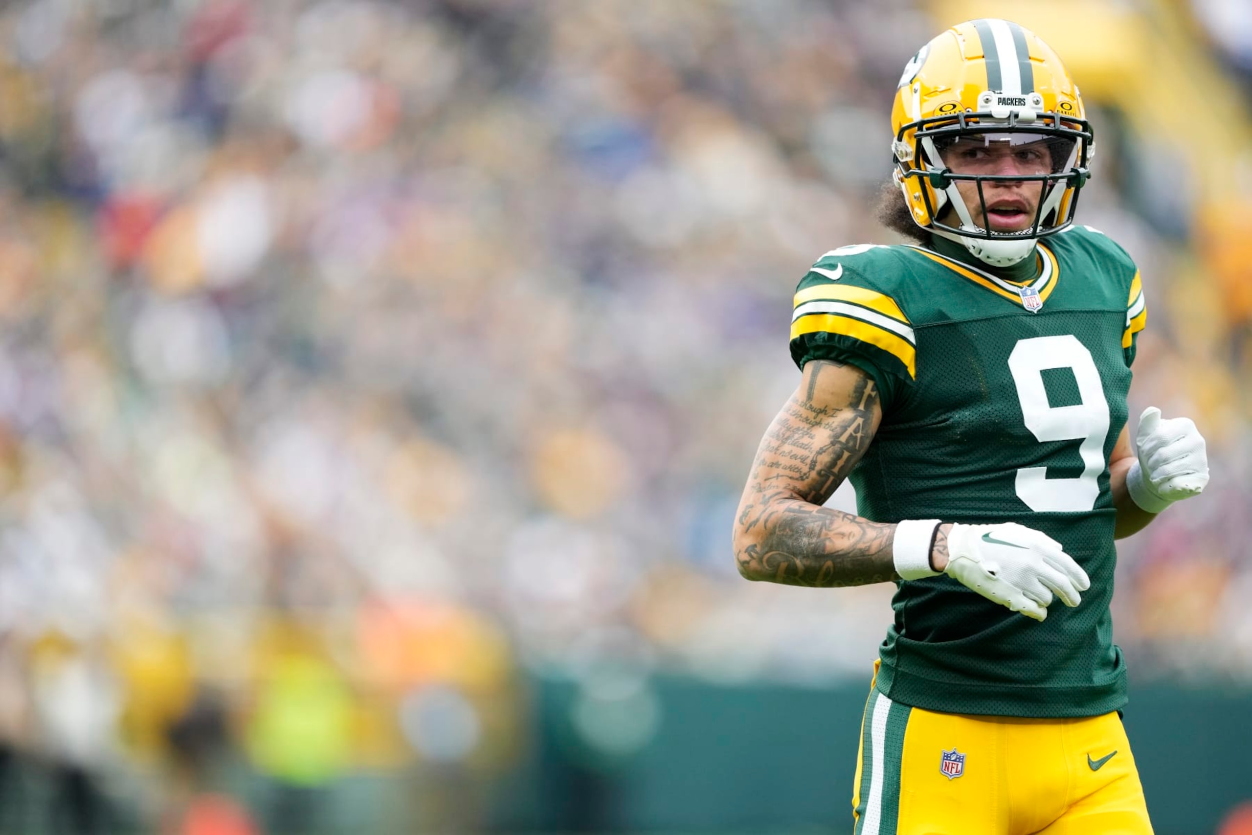 GREEN BAY, WISCONSIN - OCTOBER 29: Christian Watson #9 of the Green Bay Packers in action in the second half against the Minnesota Vikings at Lambeau Field on October 29, 2023 in Green Bay, Wisconsin. (Photo by Patrick McDermott/Getty Images) GREEN BAY, WISCONSIN - OCTOBER 29: Christian Watson #9 of the Green Bay Packers in action in the second half against the Minnesota Vikings at Lambeau Field on October 29, 2023 in Green Bay, Wisconsin. (Photo by Patrick McDermott/Getty Images)