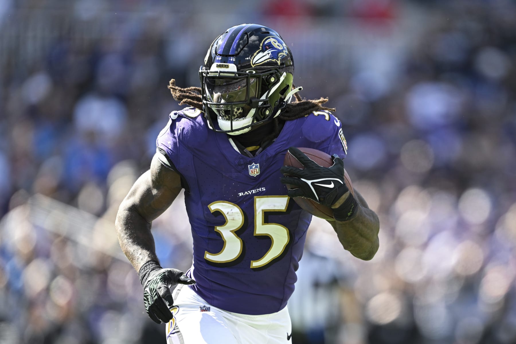 Baltimore Ravens running back Gus Edwards (35) runs the ball during the first half of an NFL football game against the Detroit Lions, Sunday, Oct. 22, 2023, in Baltimore. (AP Photo/Terrance Williams)
