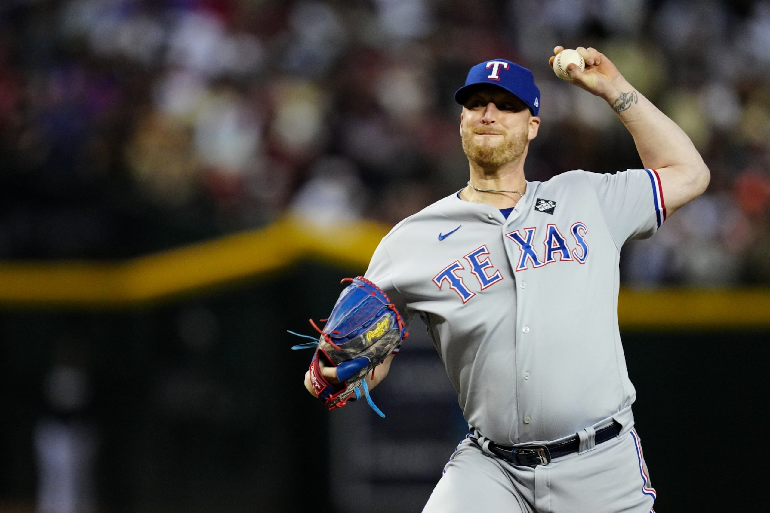 PHOENIX, AZ - OCTOBER 31:  Will Smith #51 of the Texas Rangers pitches during Game 4 of the 2023 World Series between the Texas Rangers and the Arizona Diamondbacks at Chase Field on Tuesday, October 31, 2023 in Phoenix, Arizona. (Photo by Mary DeCicco/MLB Photos via Getty Images)